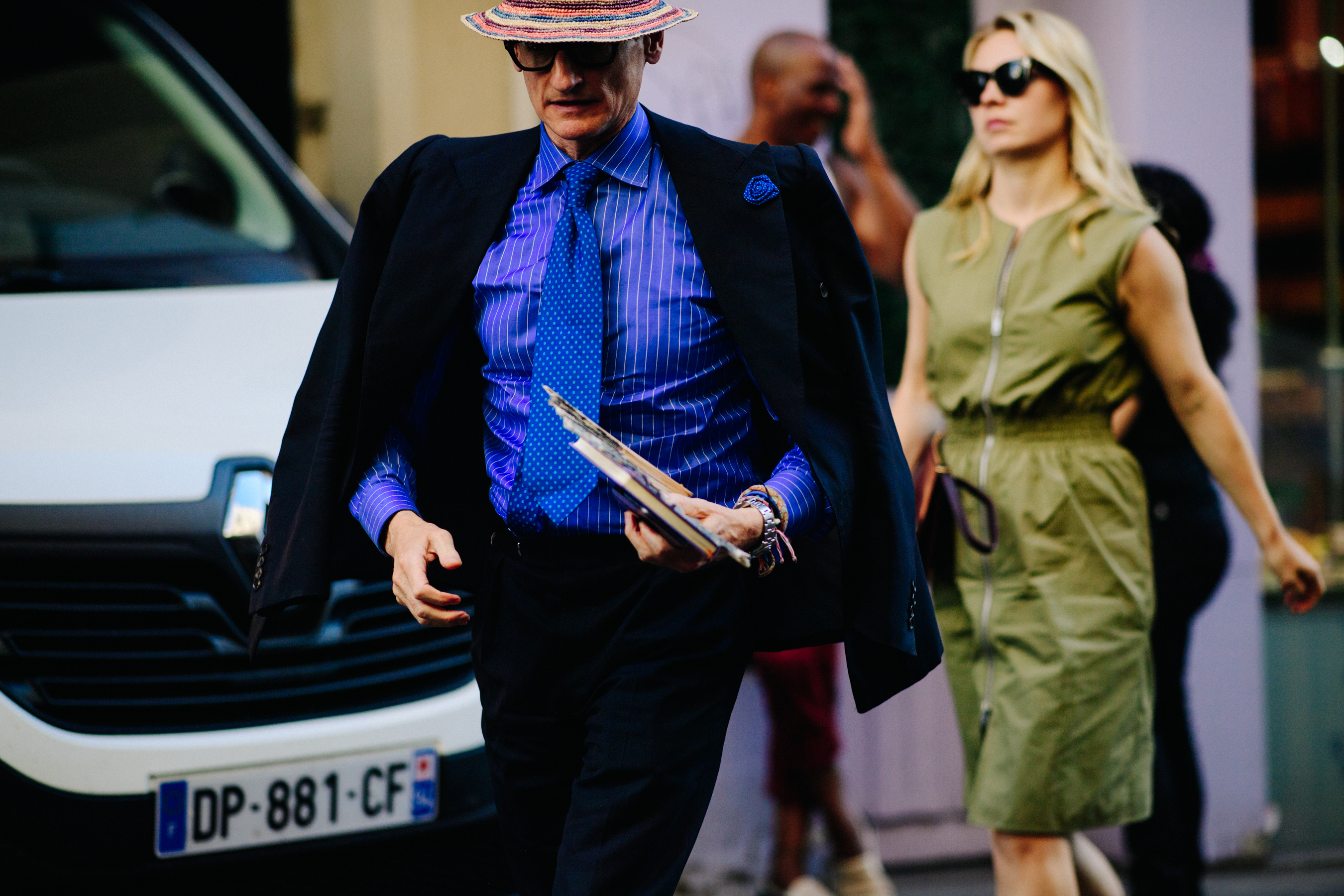 Man wearing a striped blue shirt