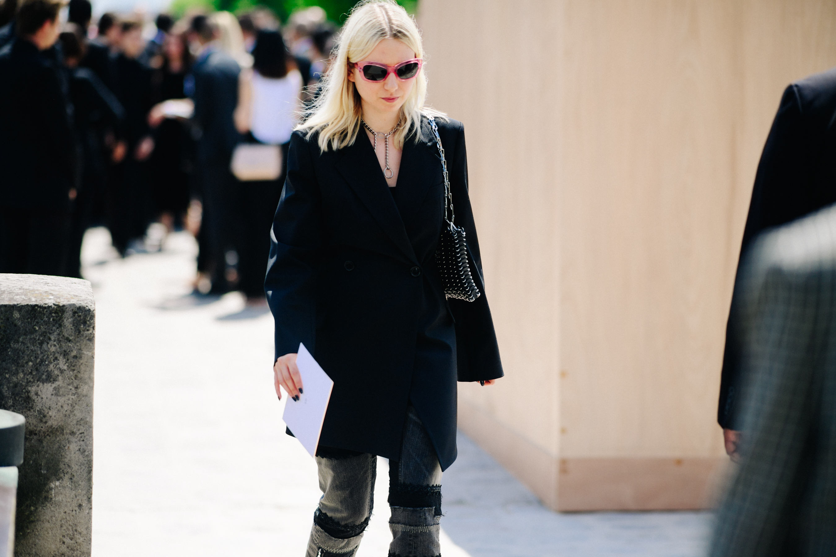 British stylist wearing pink glasses
