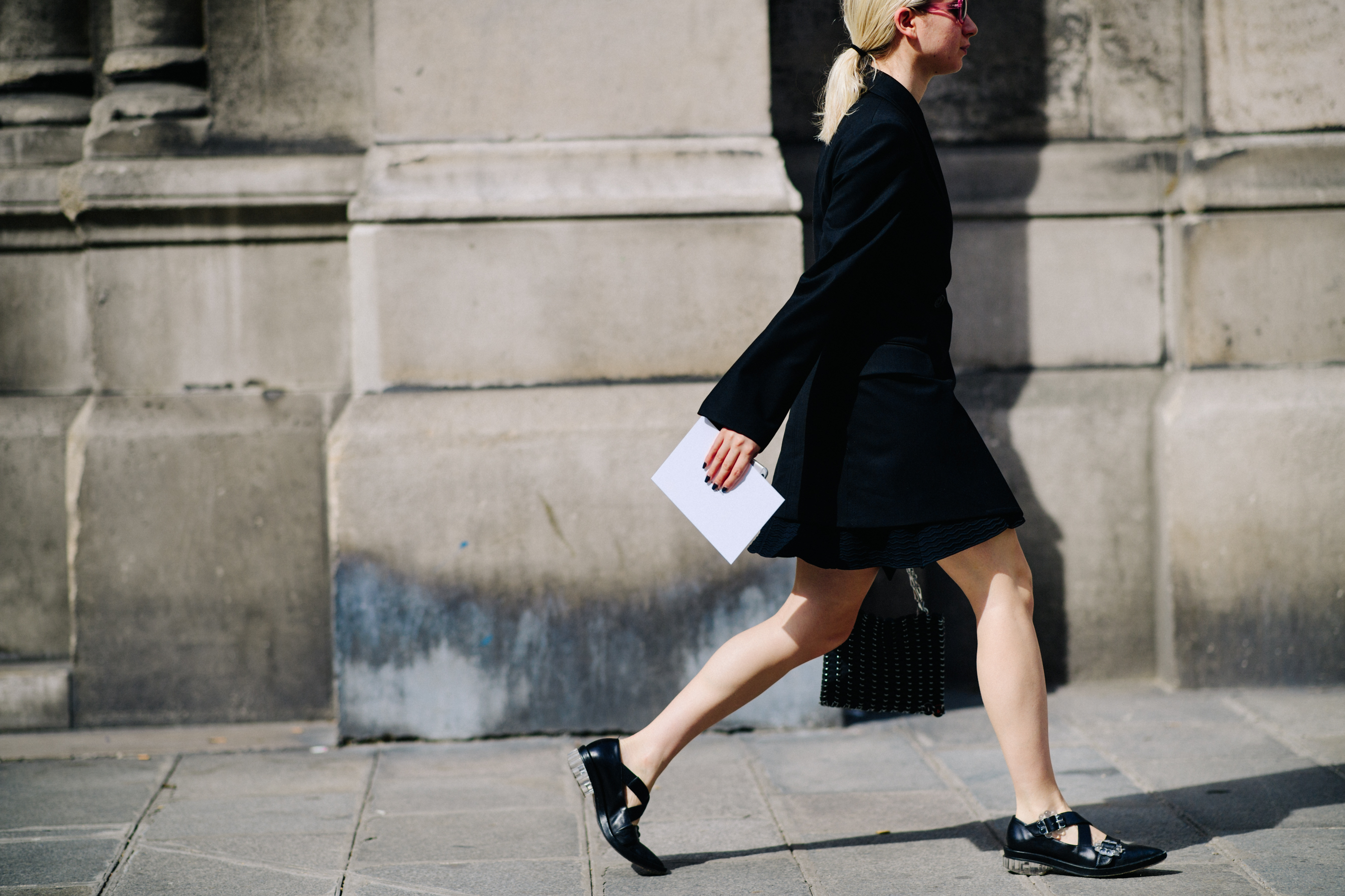 Woman wearing a short black dress