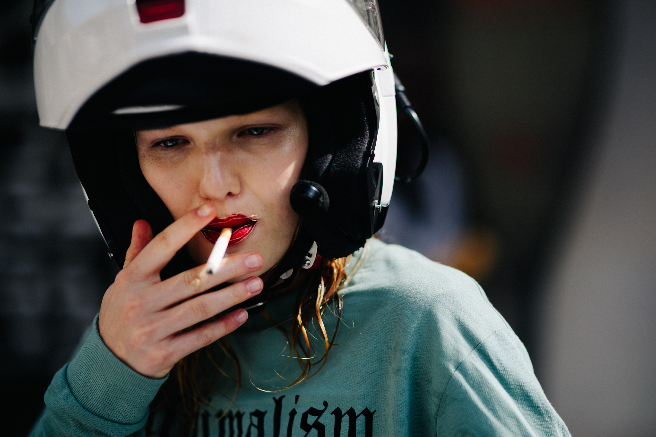 Model wearing a white helmet
