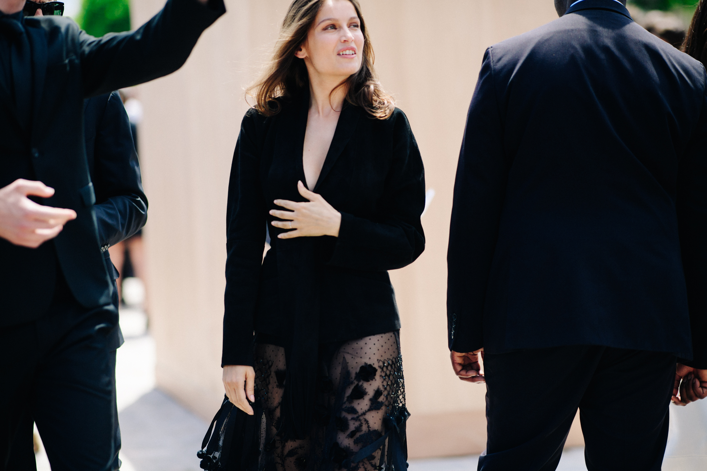 Super model wearing long black dress