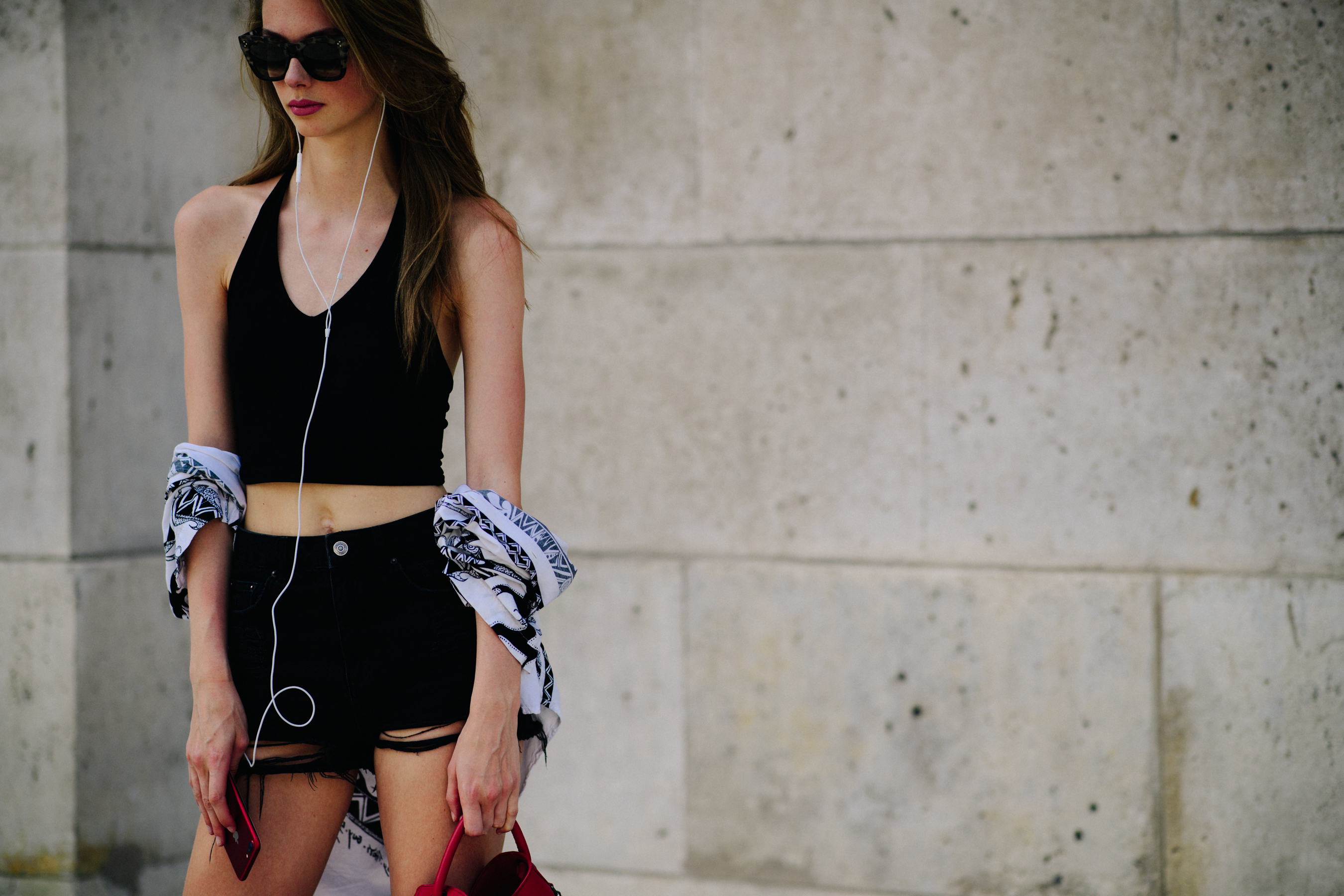 Female model wearing black shorts