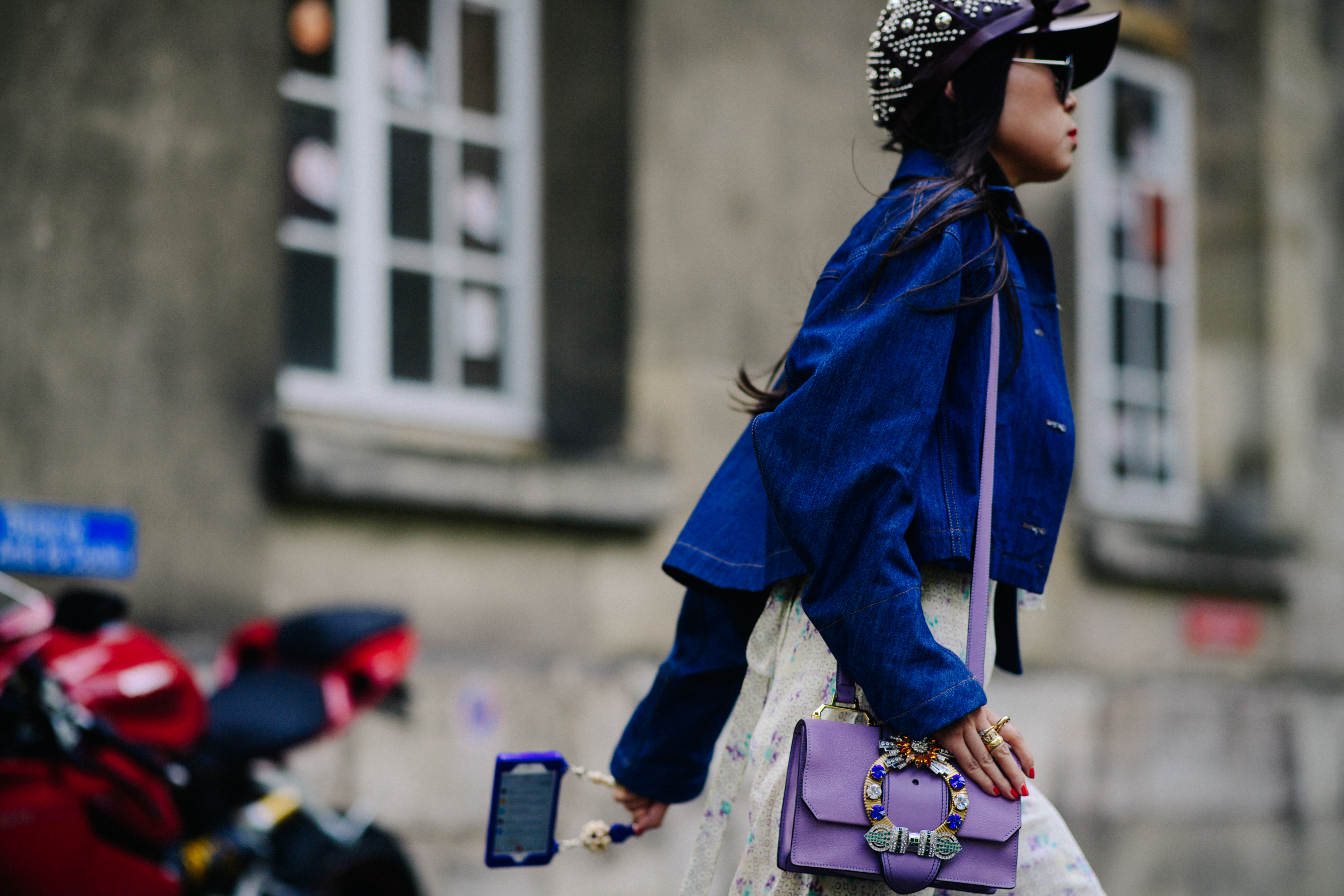 Blogger with jewelled hand bag