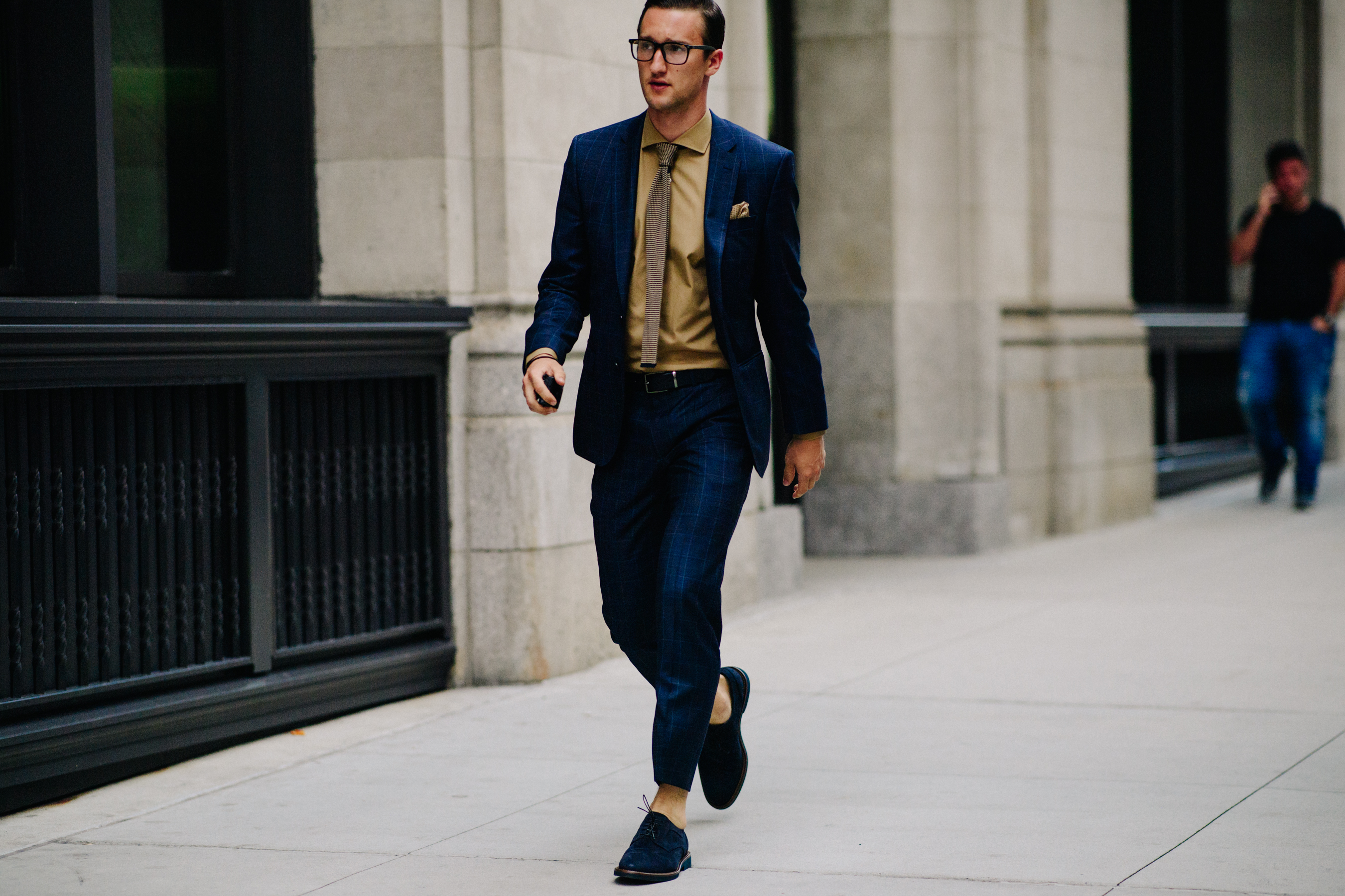 American bloger wearing suit