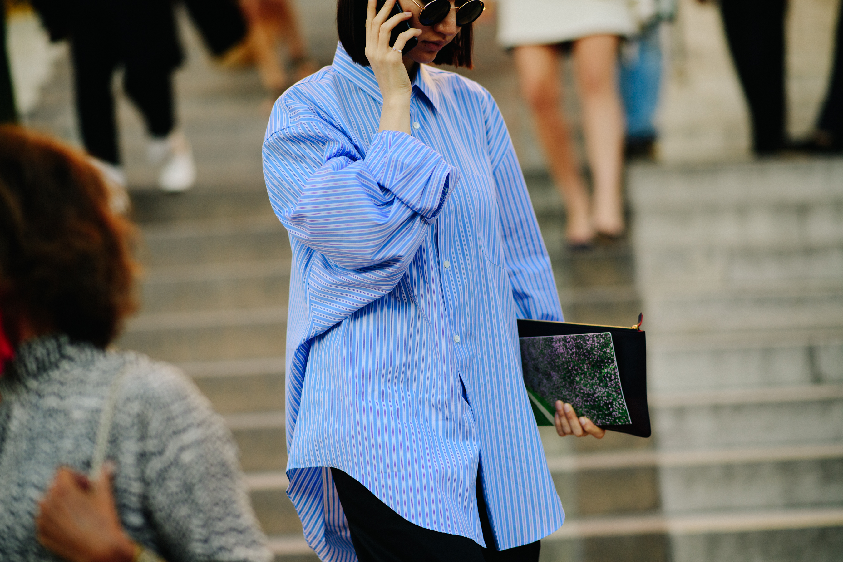 Digital influencer wearing blue shirt