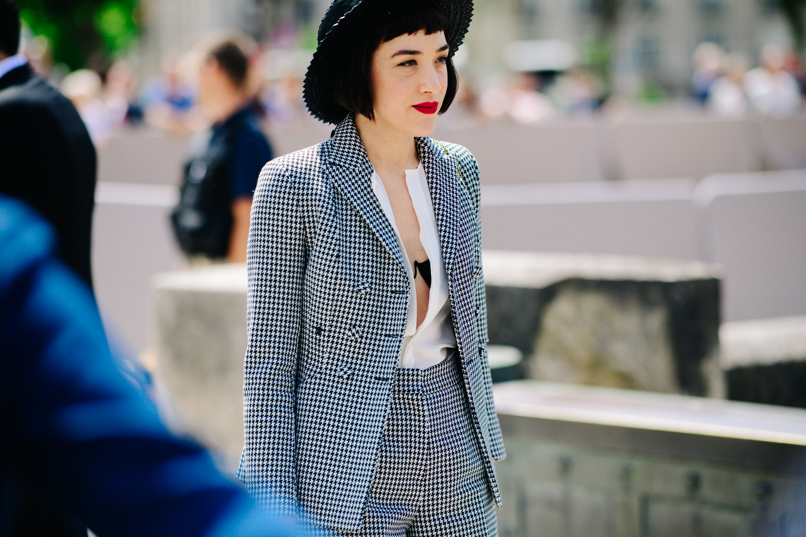 Woman wearing black and white suit