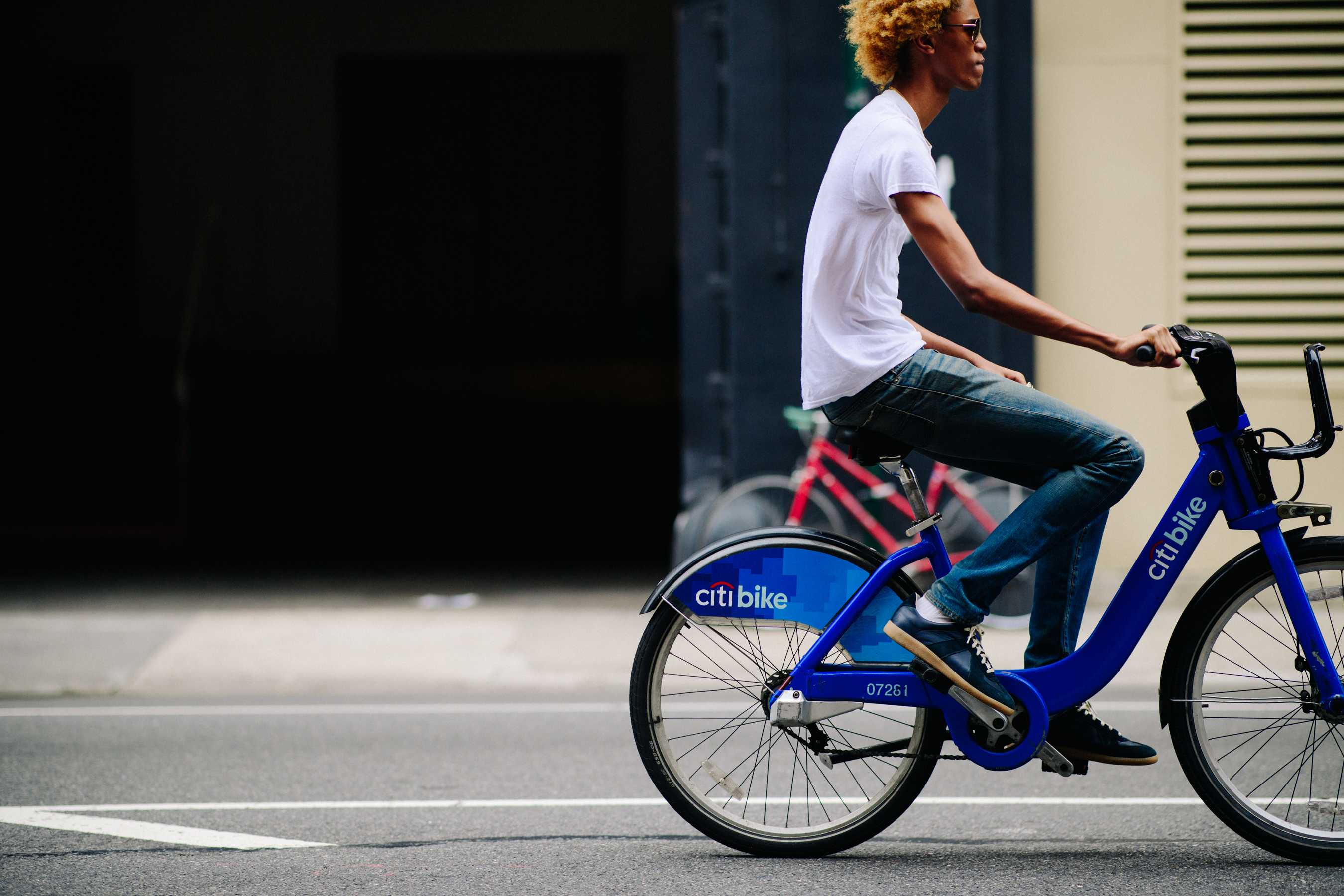 Male model riding a bicycle