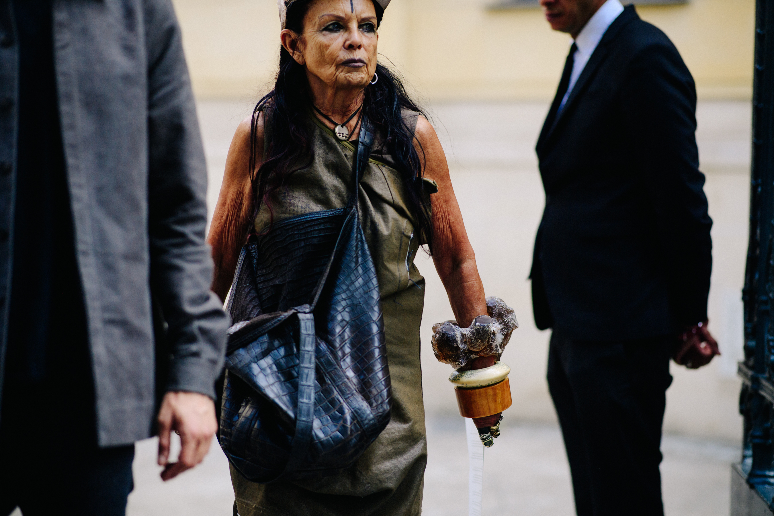Woman wearing huge stone bracelets