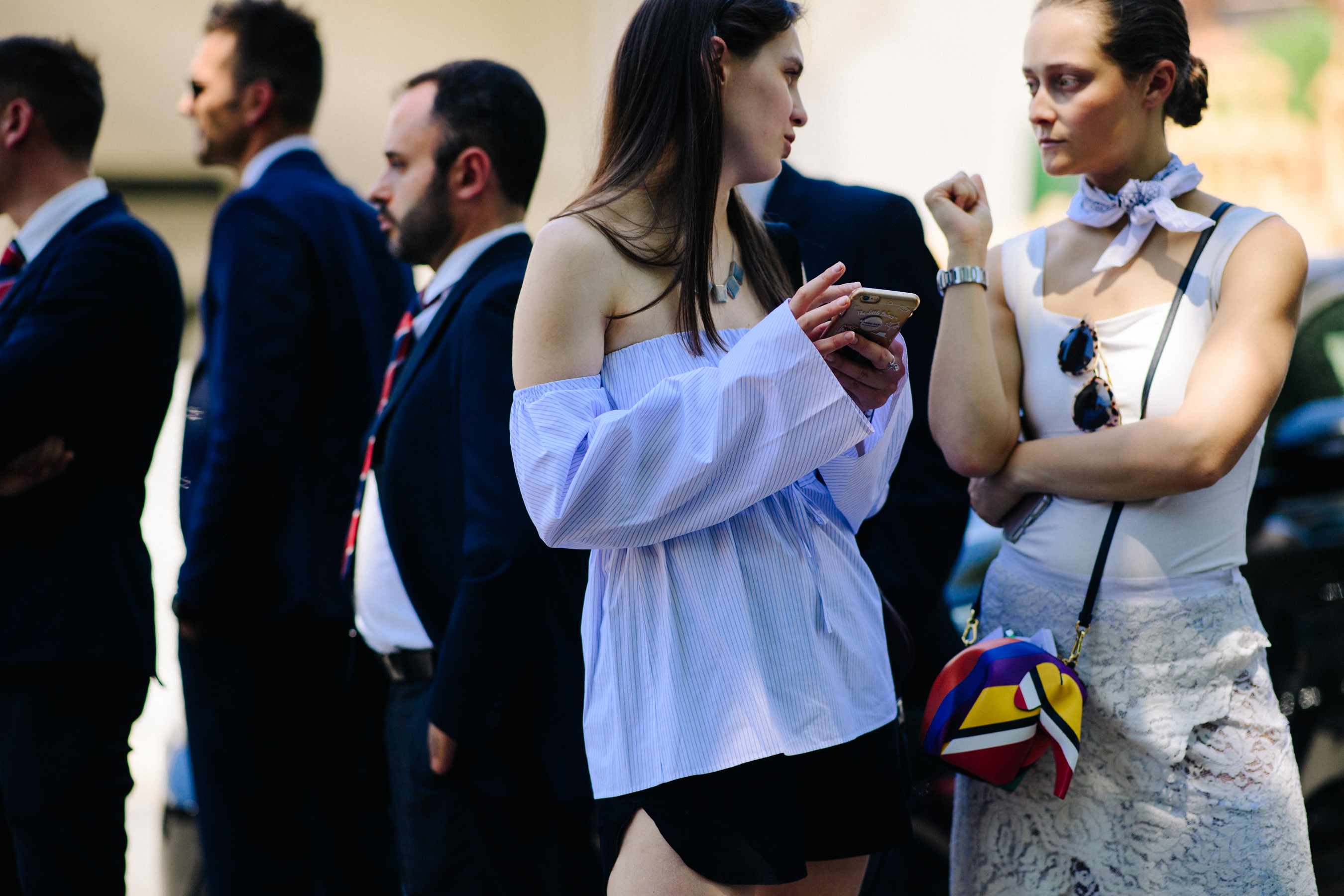 Two women chatting on the street