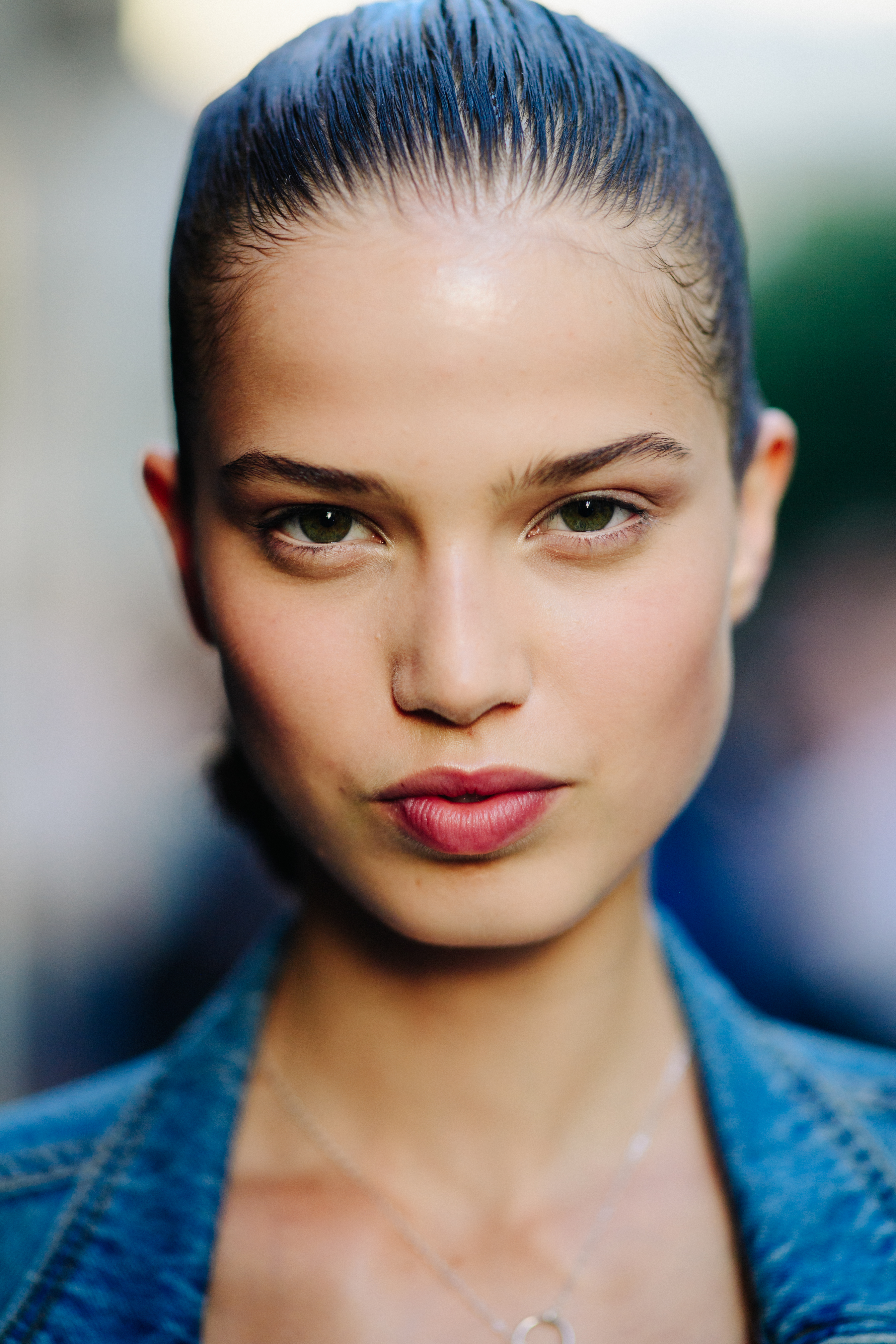 Female model wearing a denim jacket