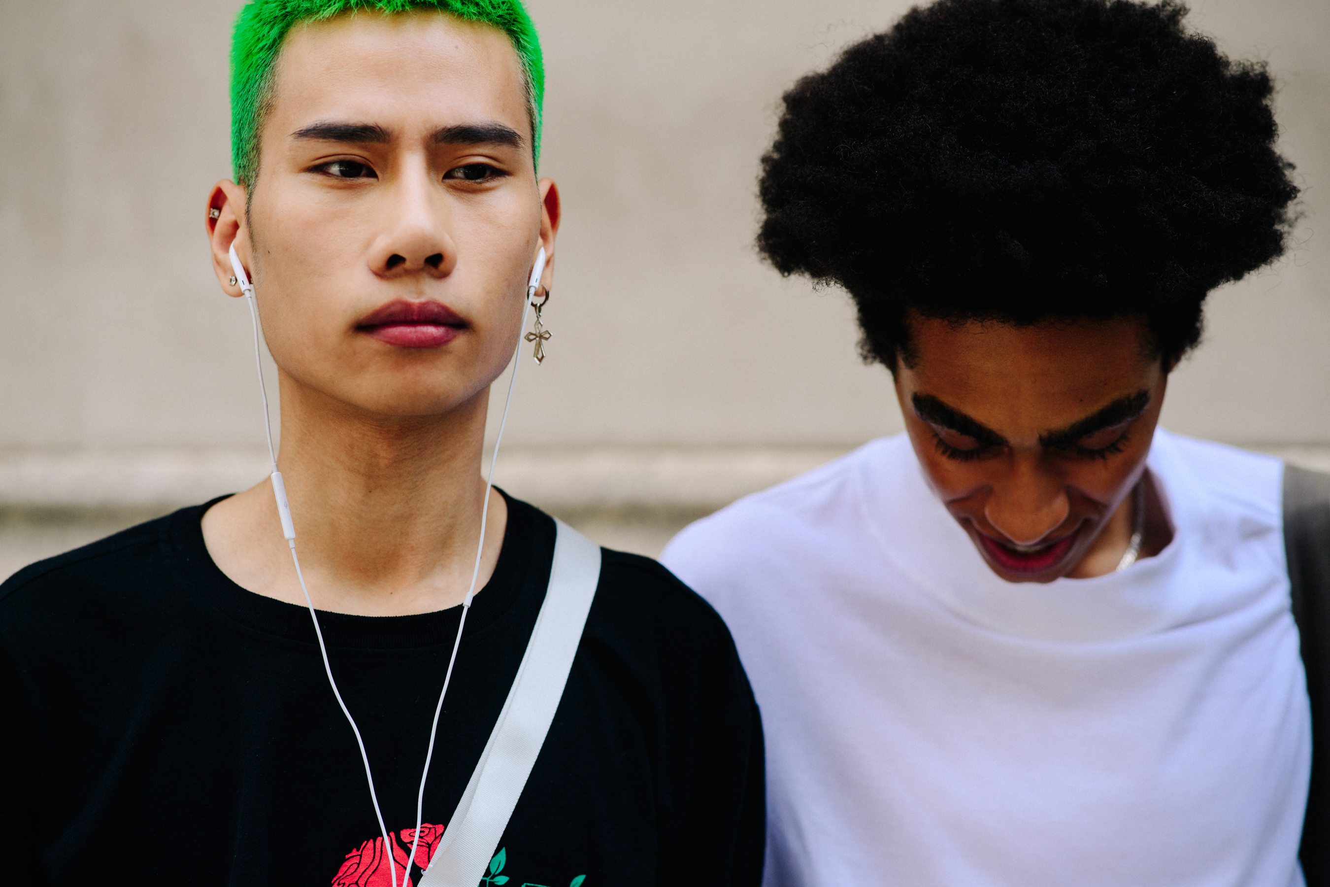 Two male models after a show