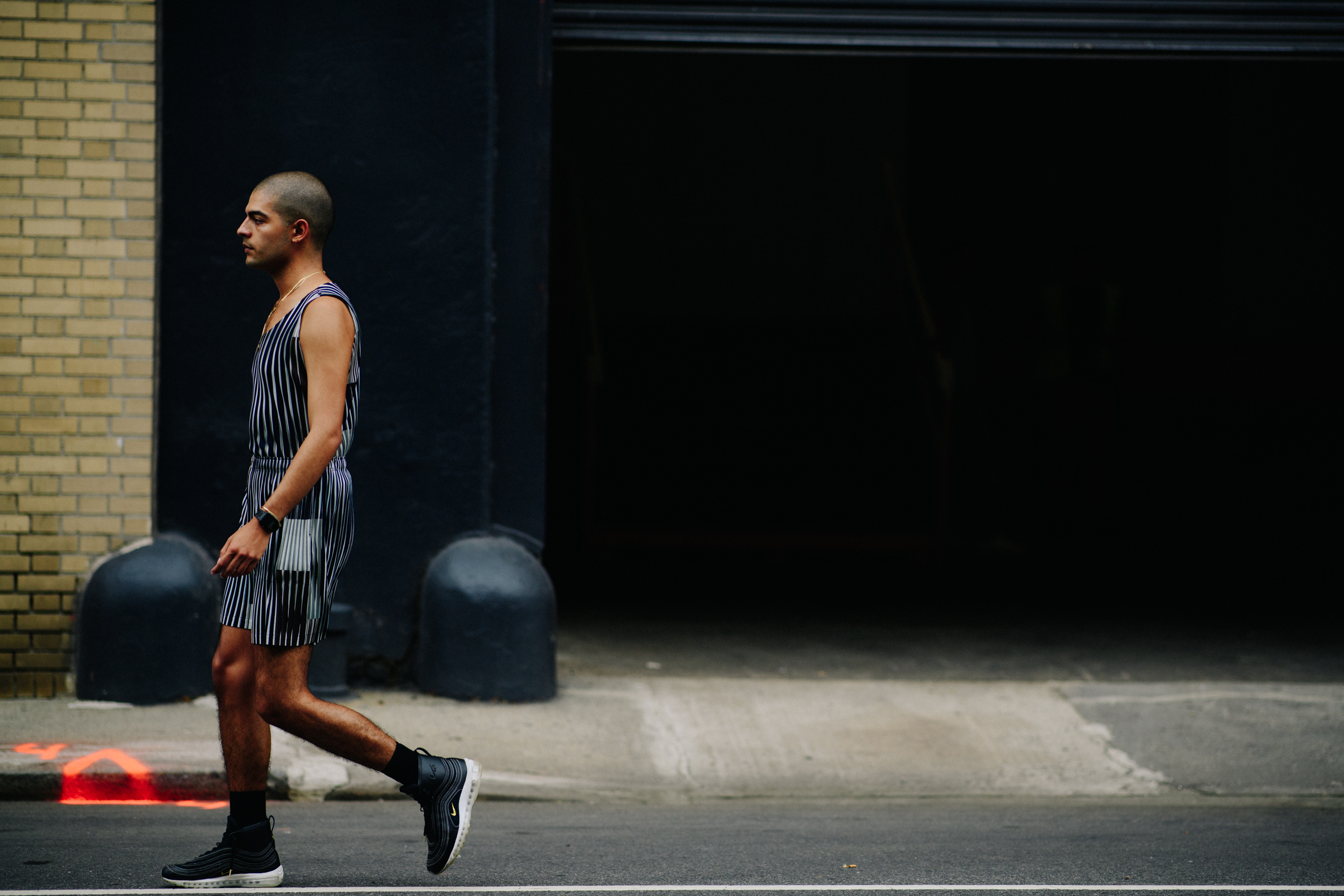 Man wearing Nike x Riccardo Tisci sneakers