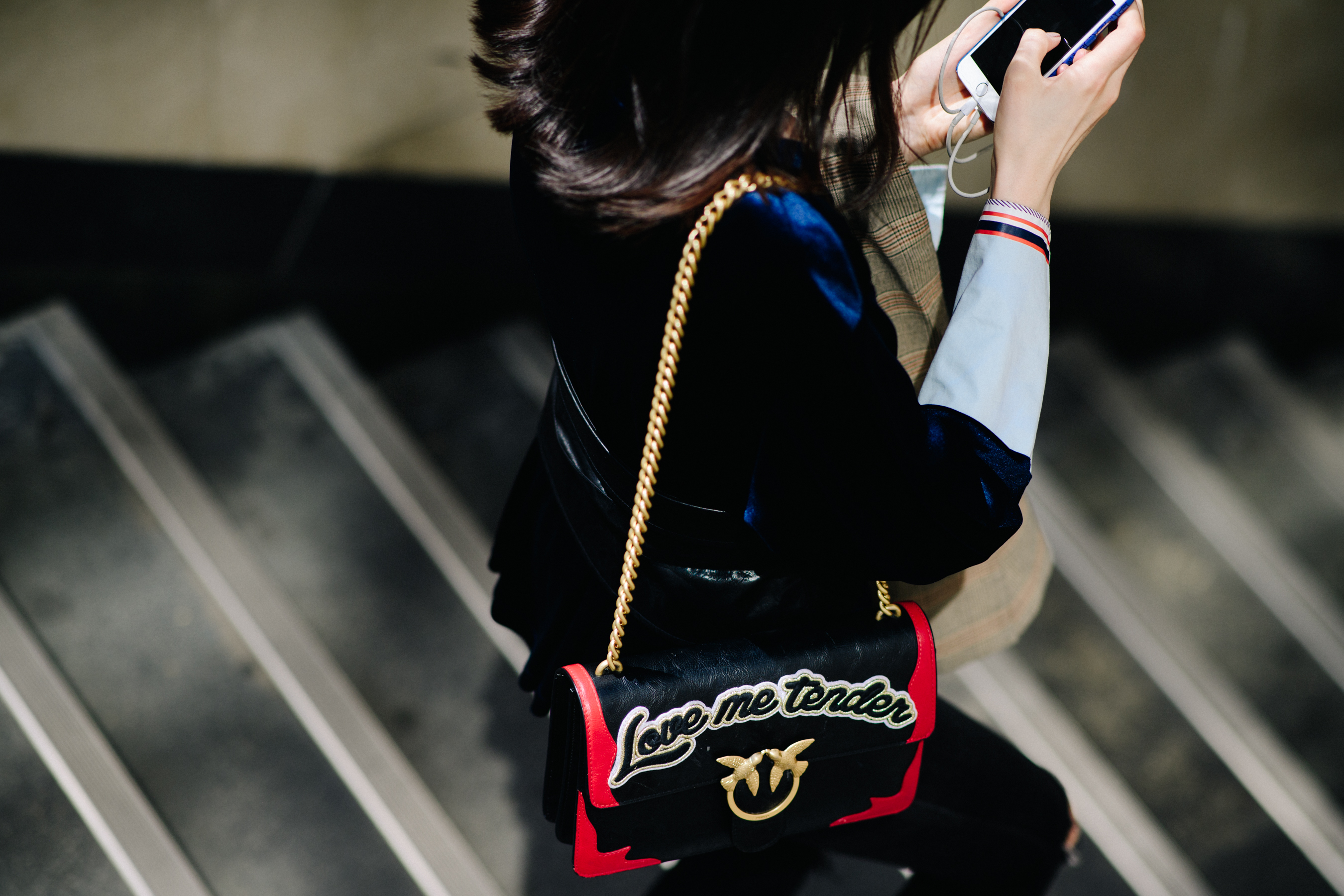 Woman wearing Gucci handbag