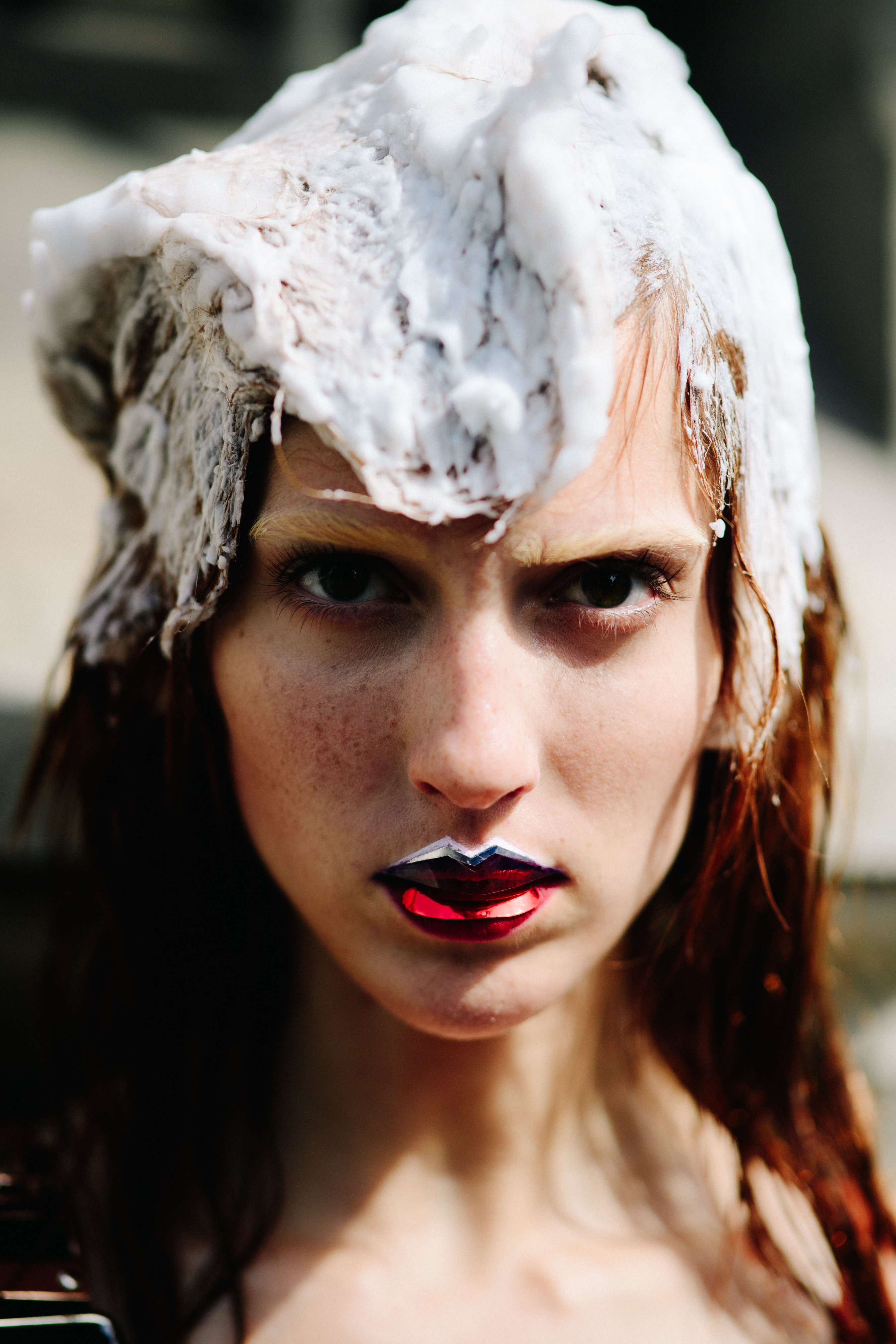 Portrait of a model with lip jewellery