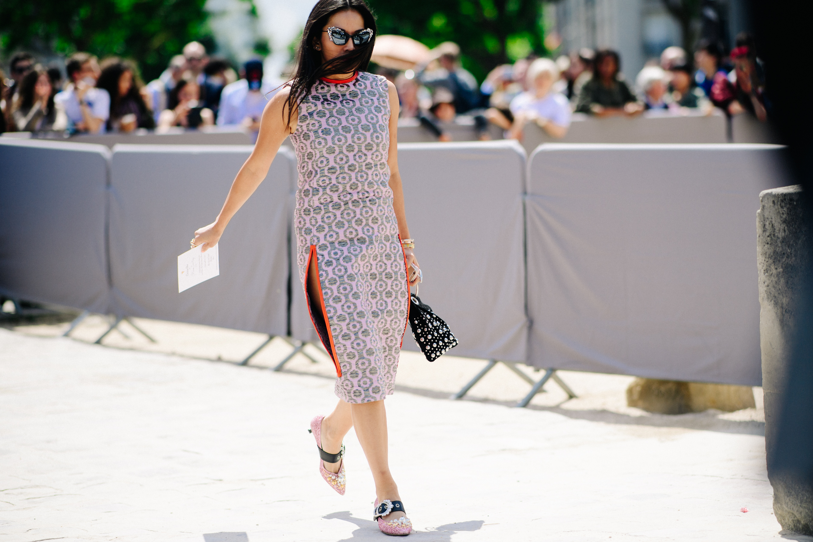 Woman wearing dress before Christian Dior