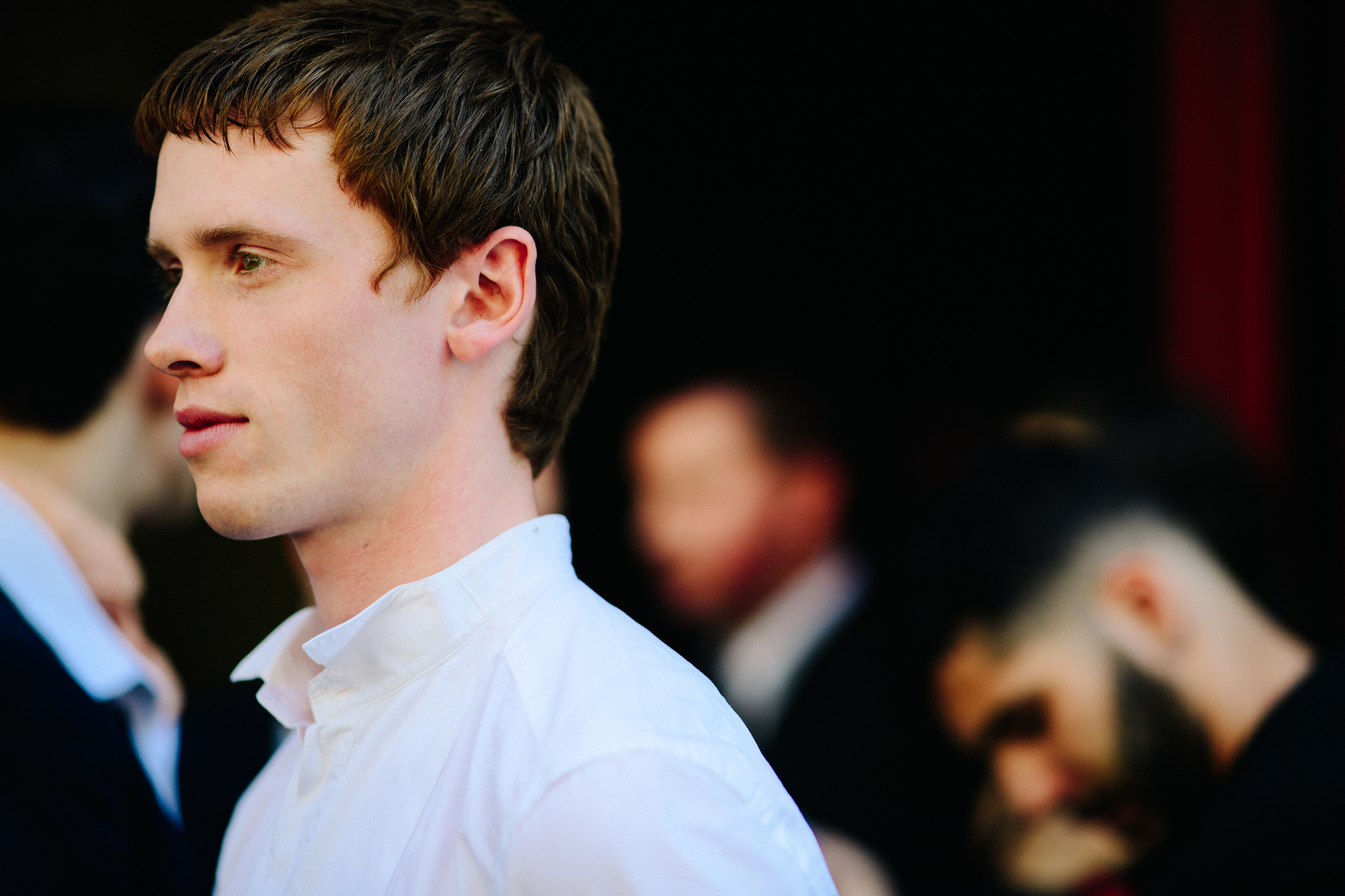British model and musician wearing shirt