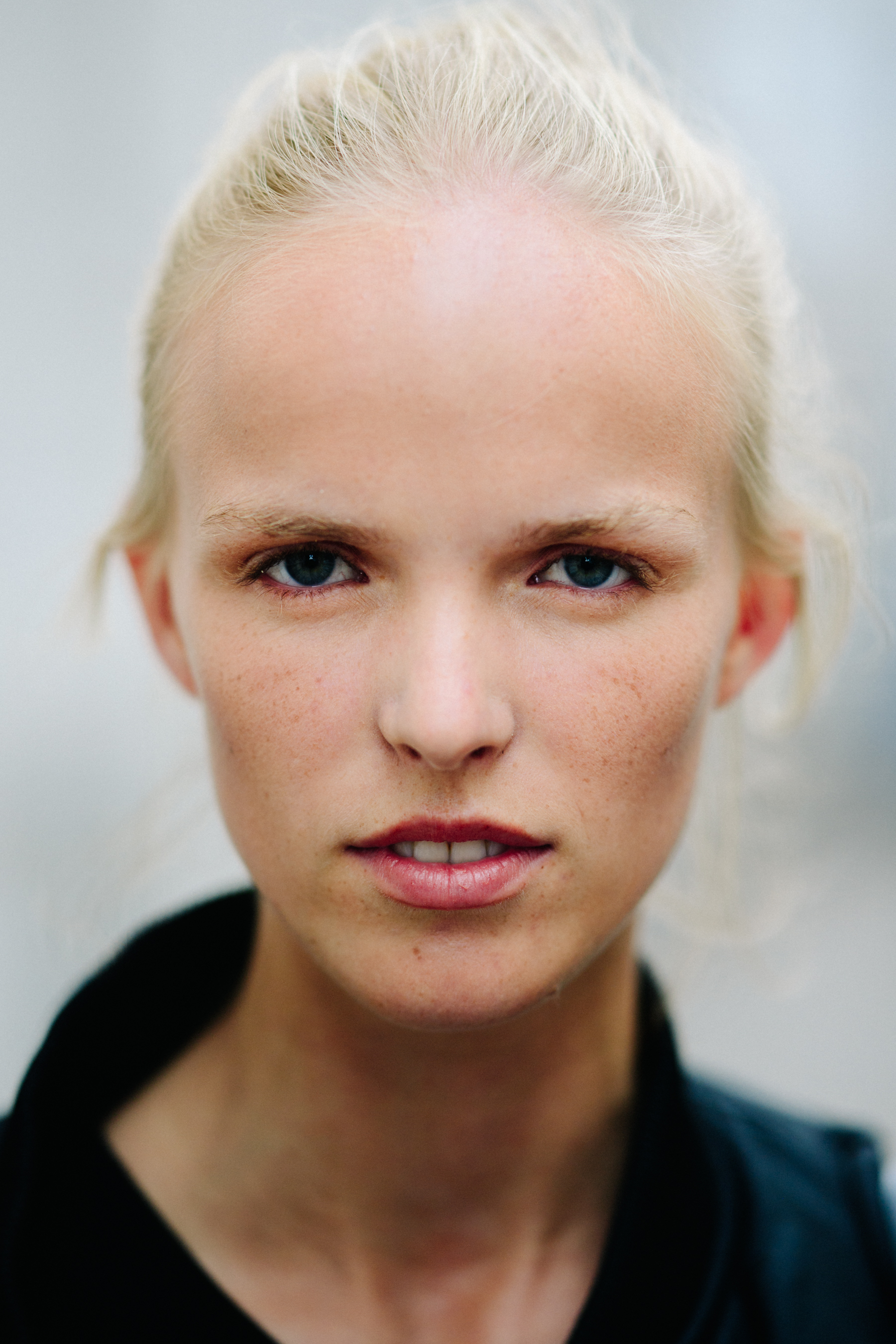 Portrait of a blonde model after a show