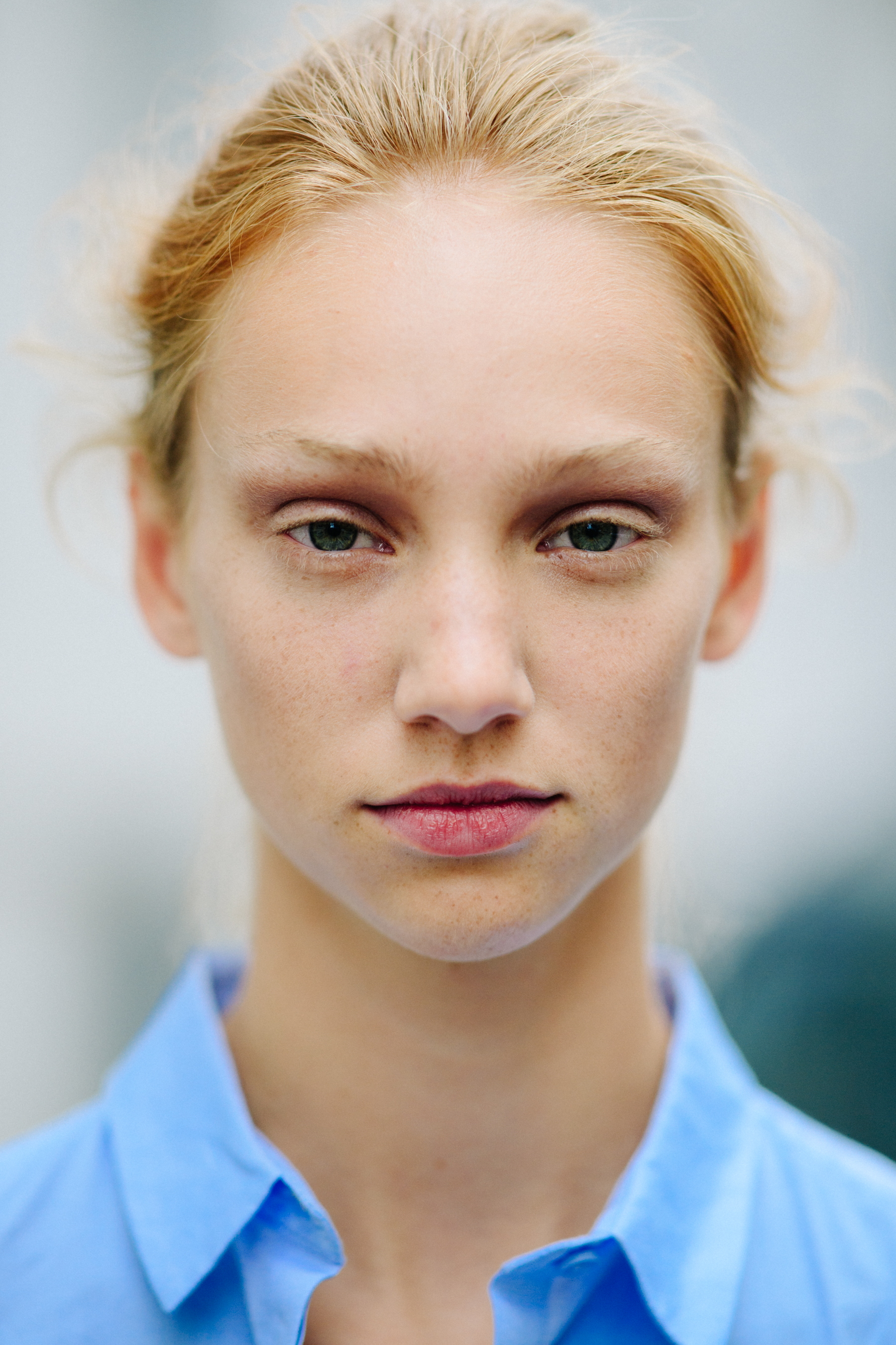 Portrait of a blonde model after a show
