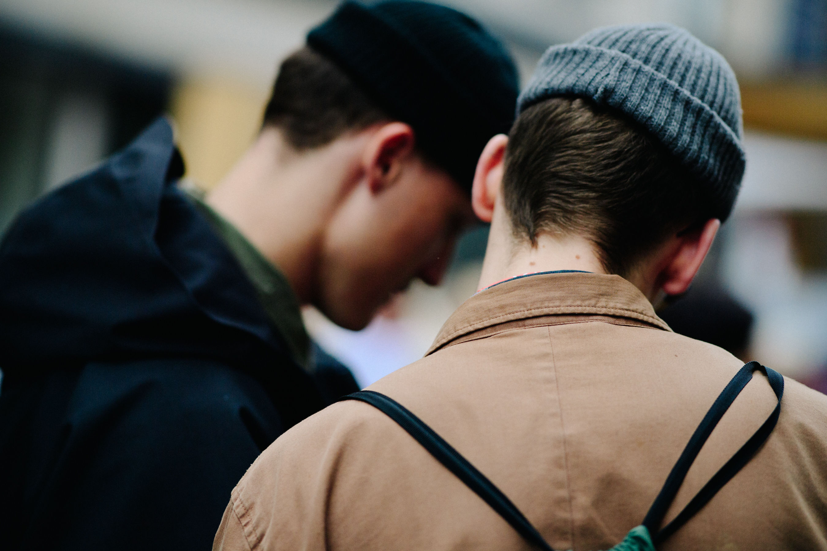Two male models after a show