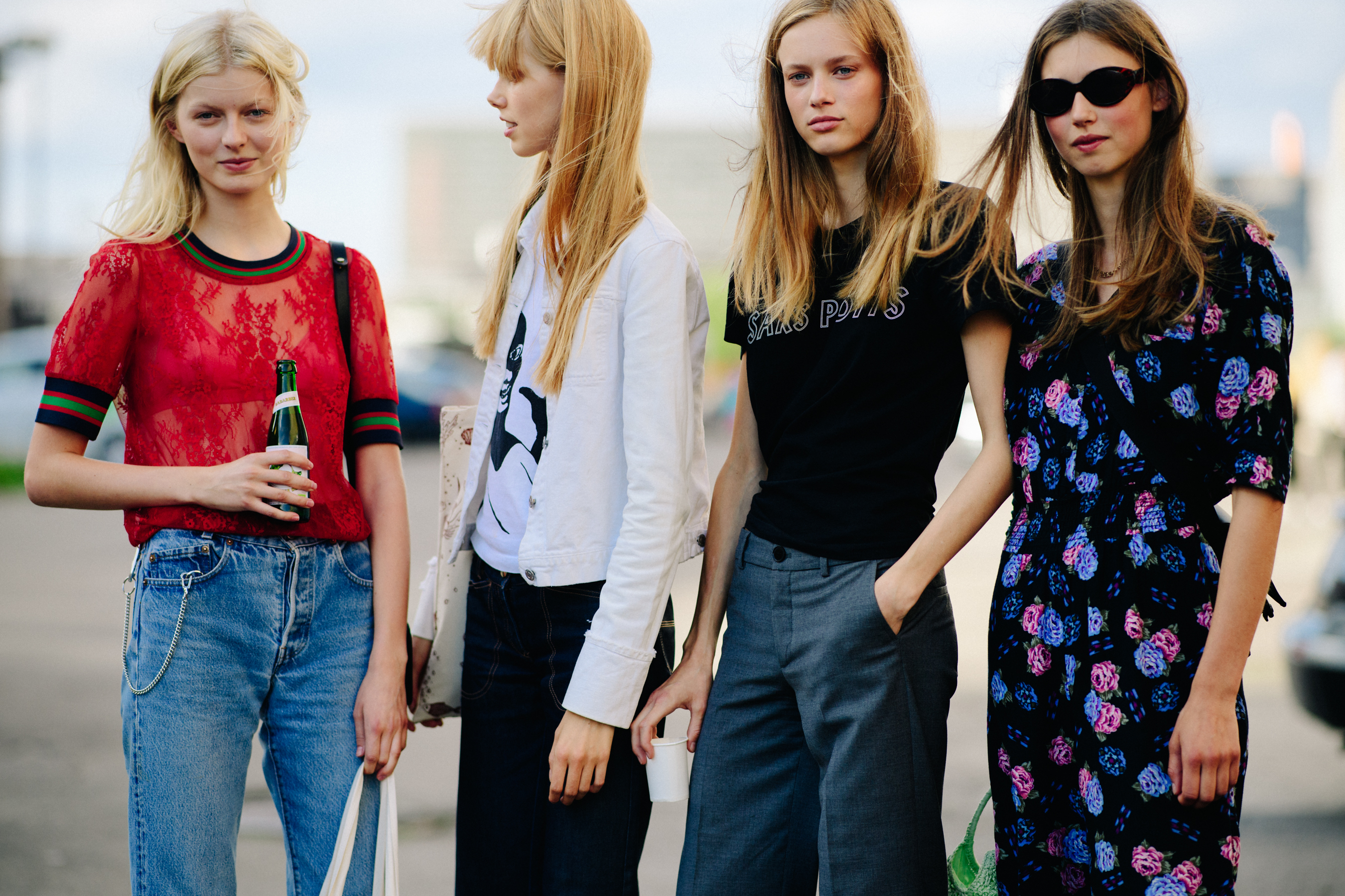 Group of four models after a show