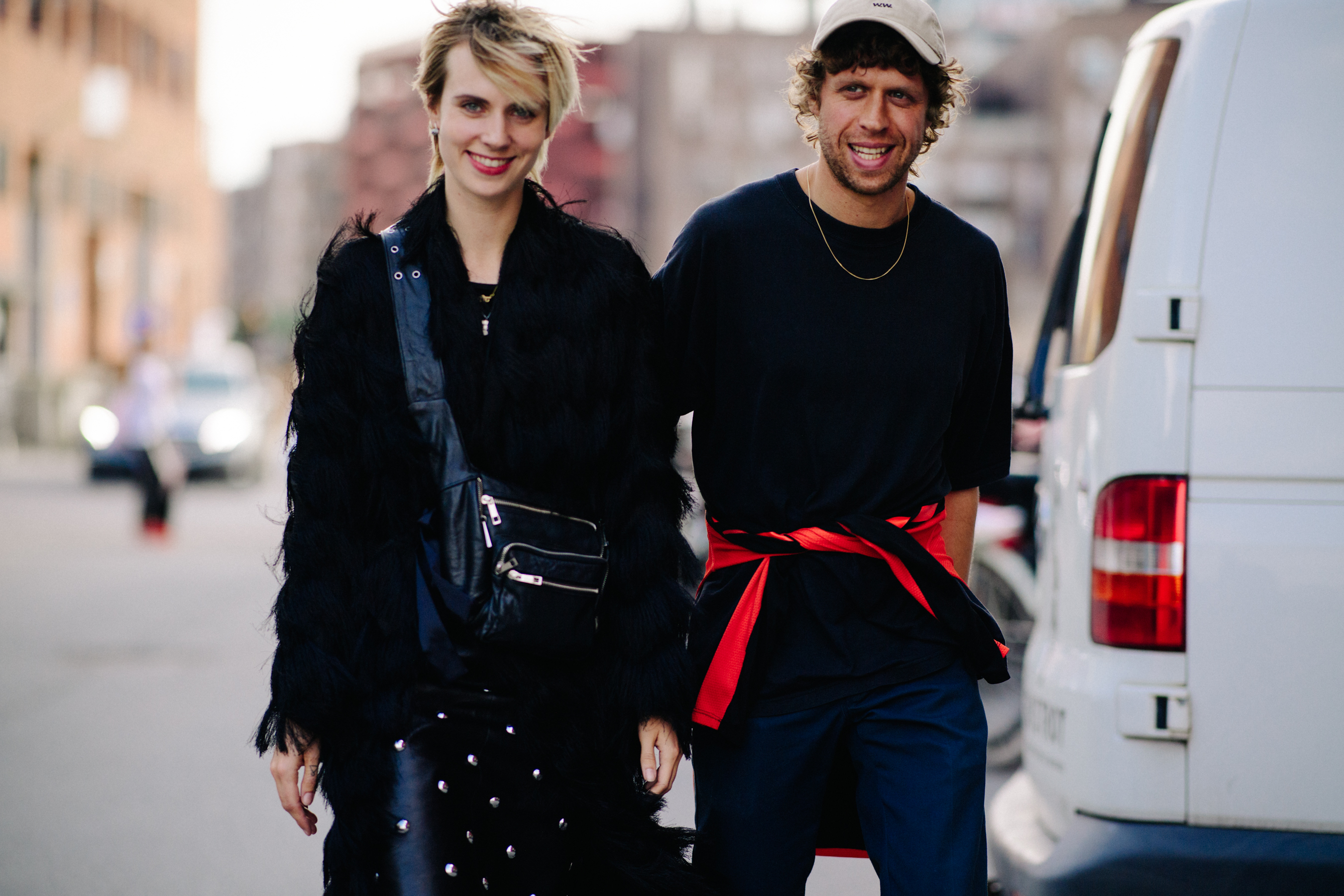 Man and woman wearing black