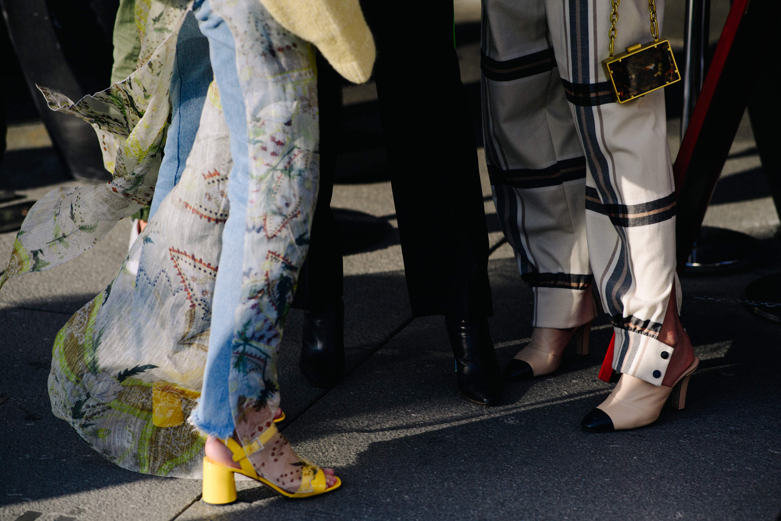 Woma wearing yellow sandals and a dress