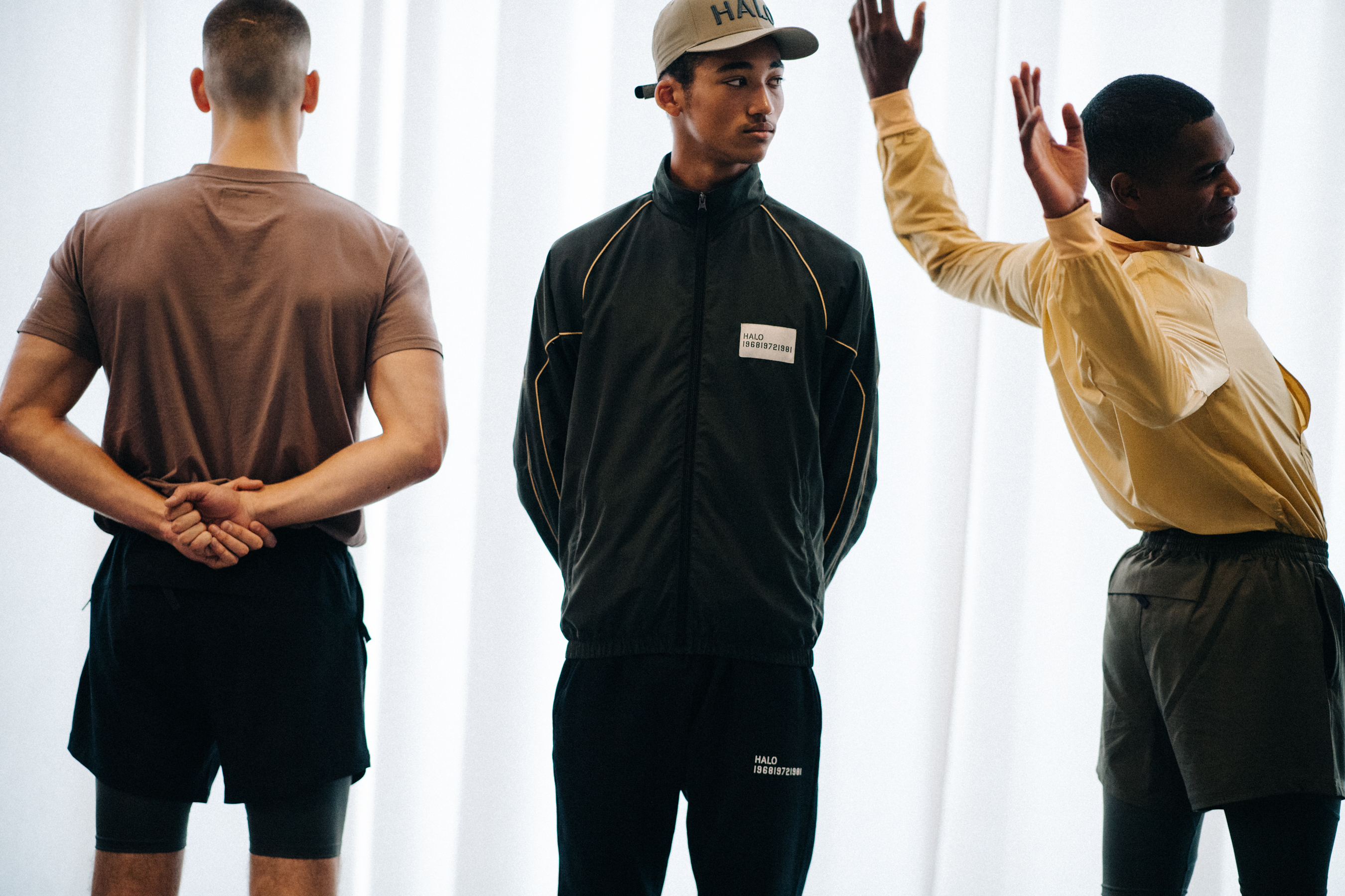 Group of models wearing street wear