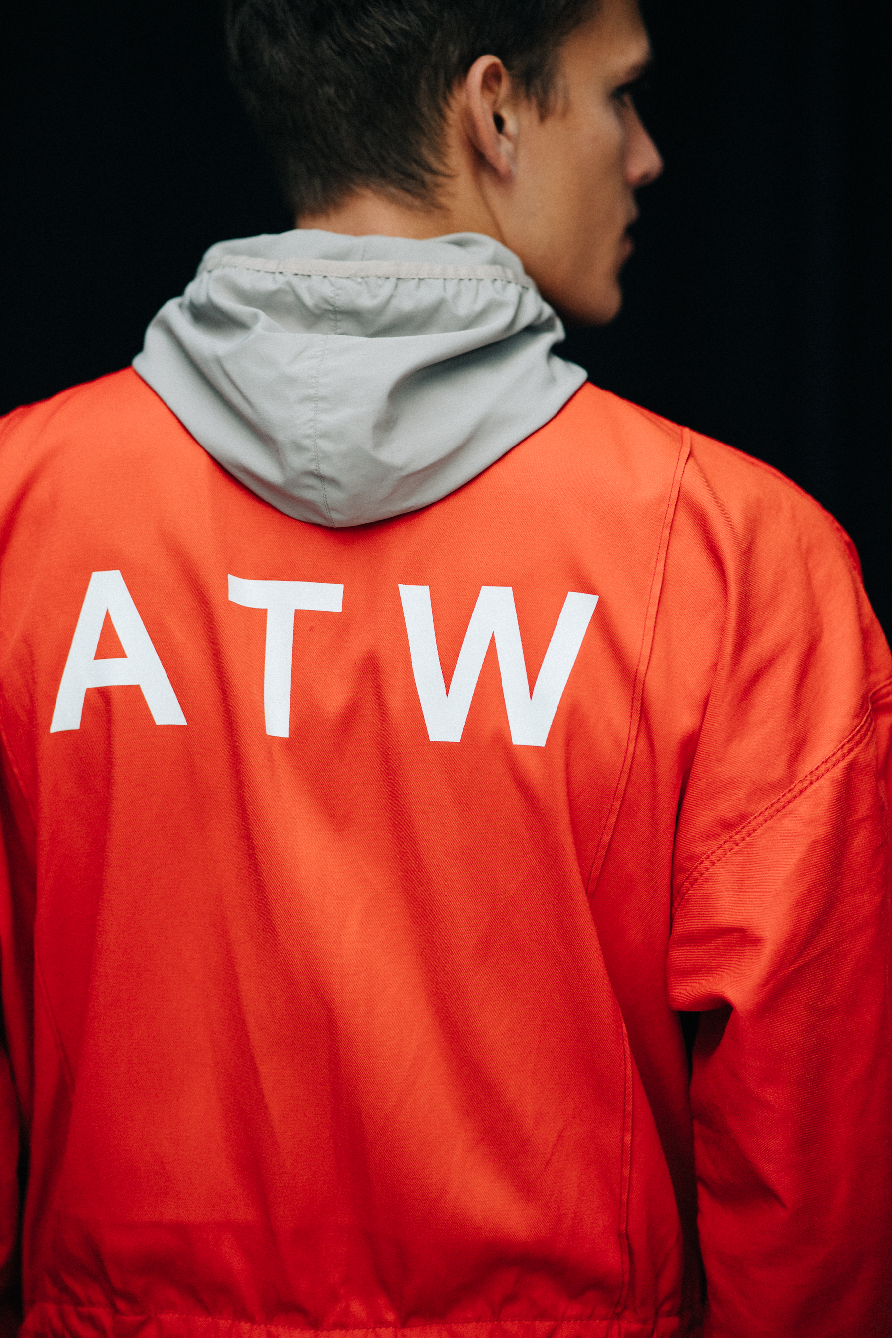 Male model wearing red jacket