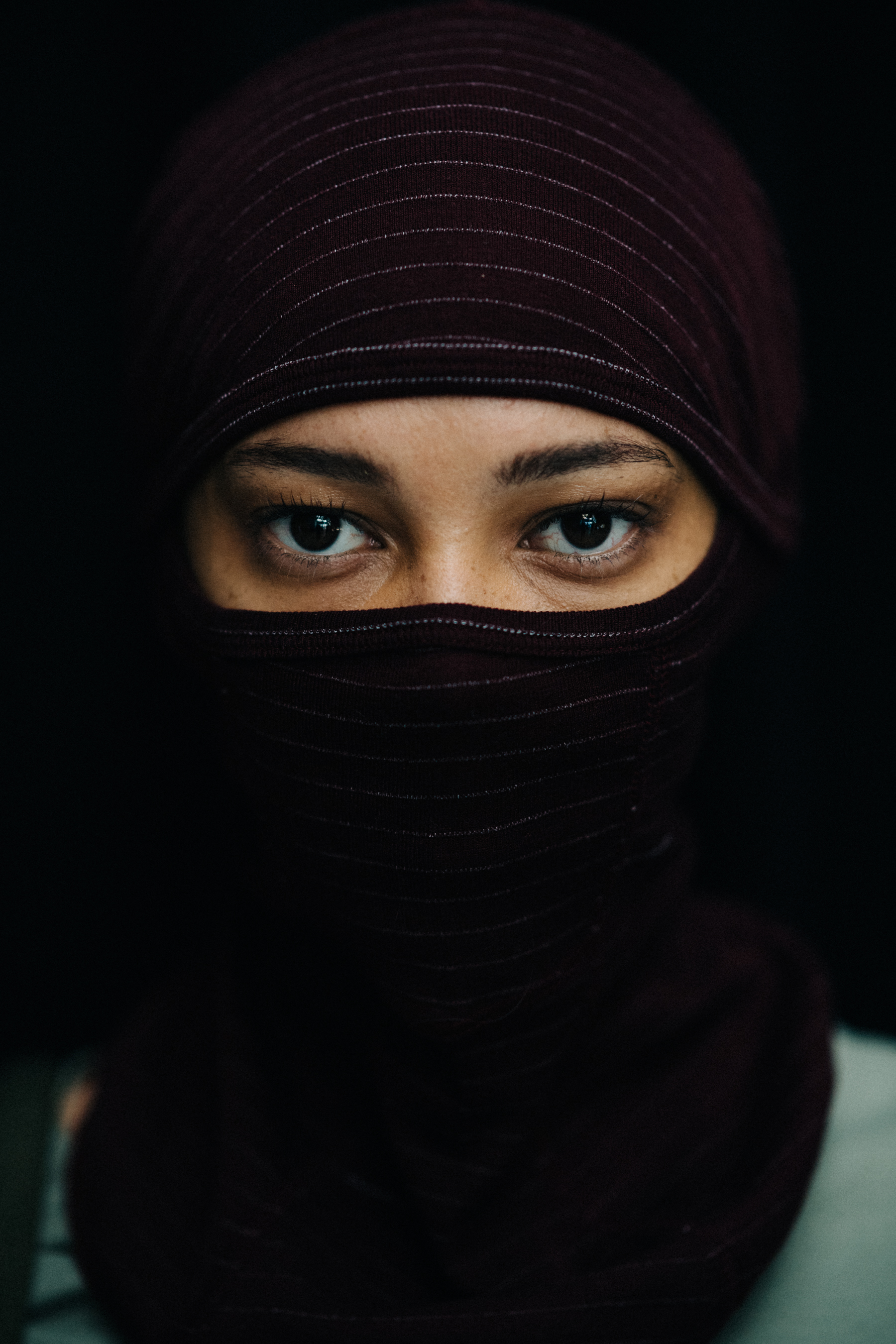 Portait of a model with face covered