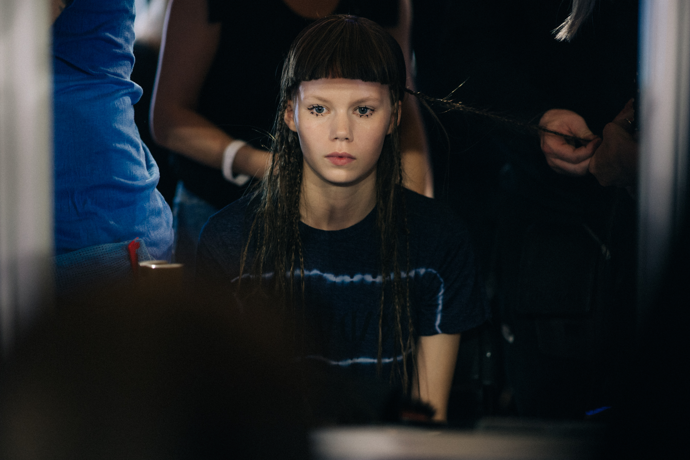 Model getting hair and make up done