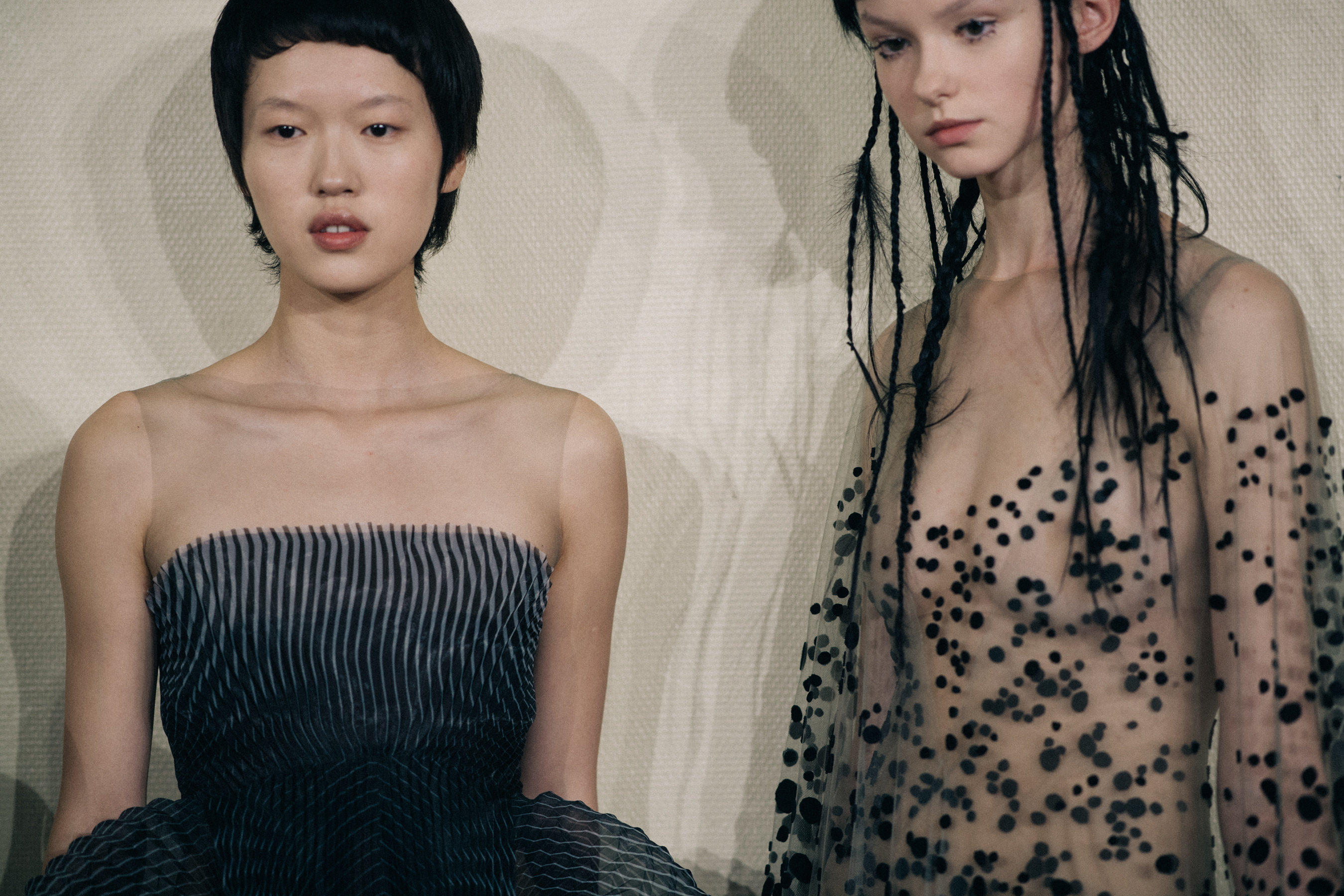 Models wearing beautiful sheer dresses
