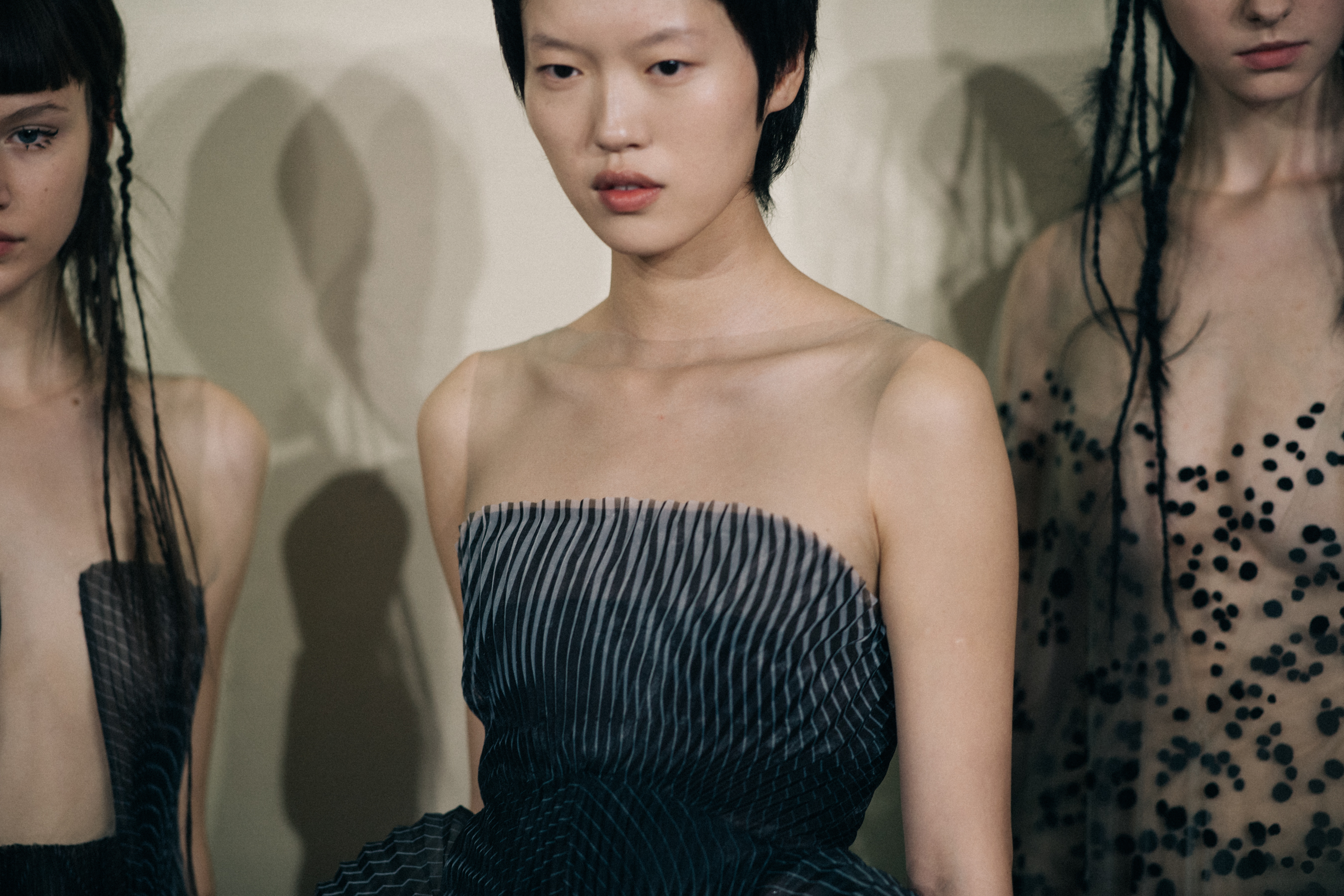 Models wearing beautiful sheer dresses
