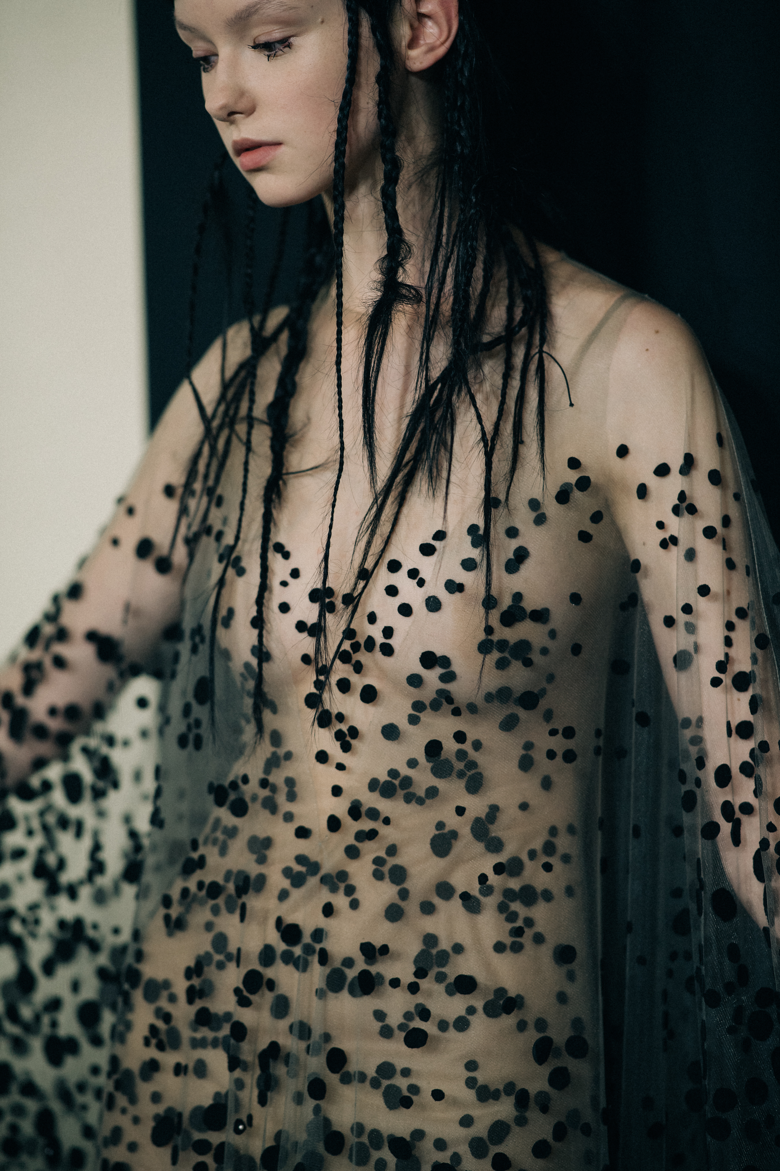 Model wearing beautiful dress before a show