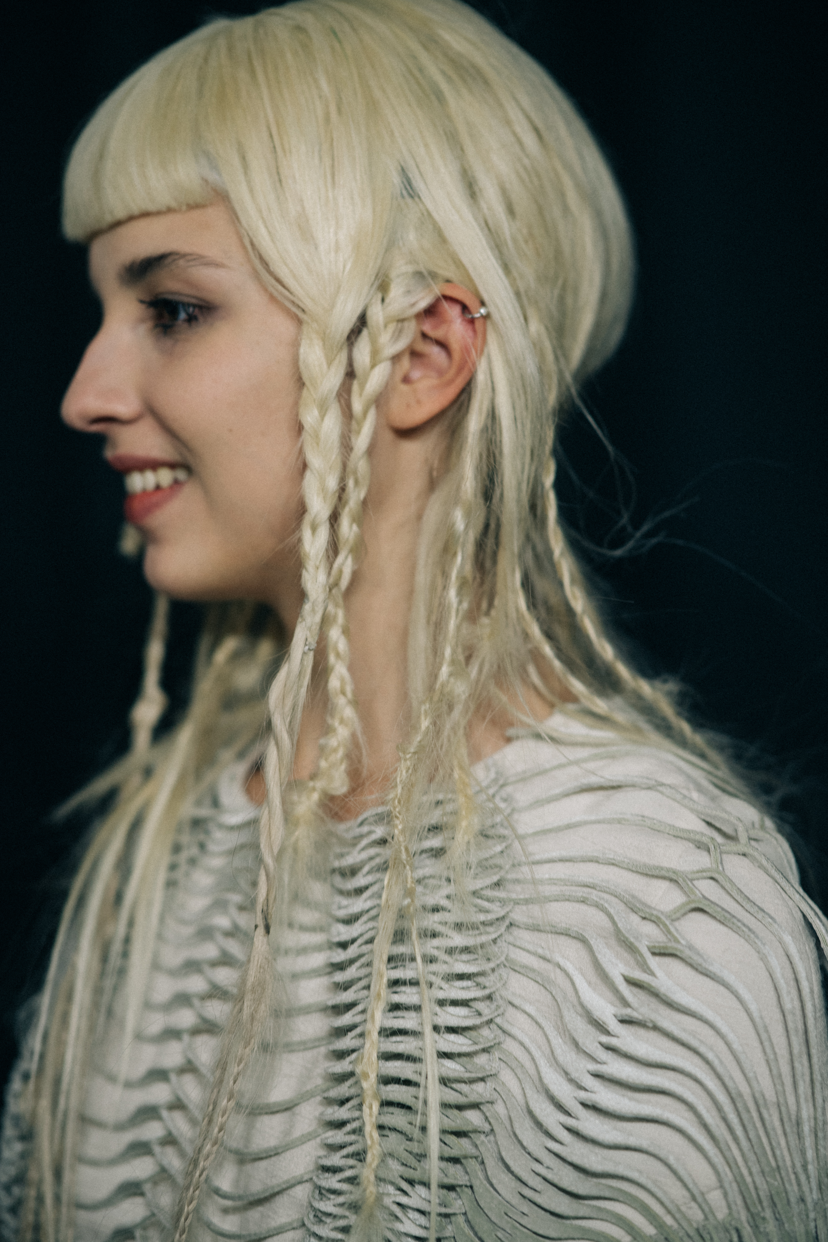 Model wearing beautiful dress before a show