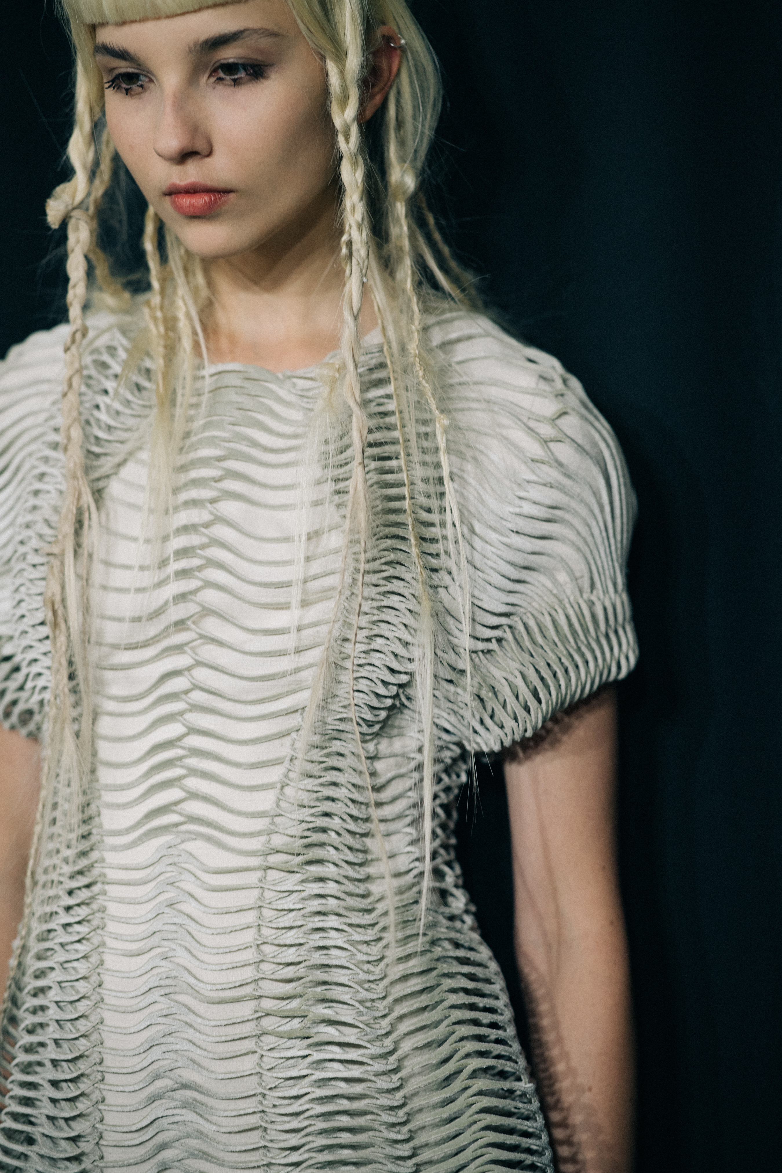 Model wearing beautiful dress before a show