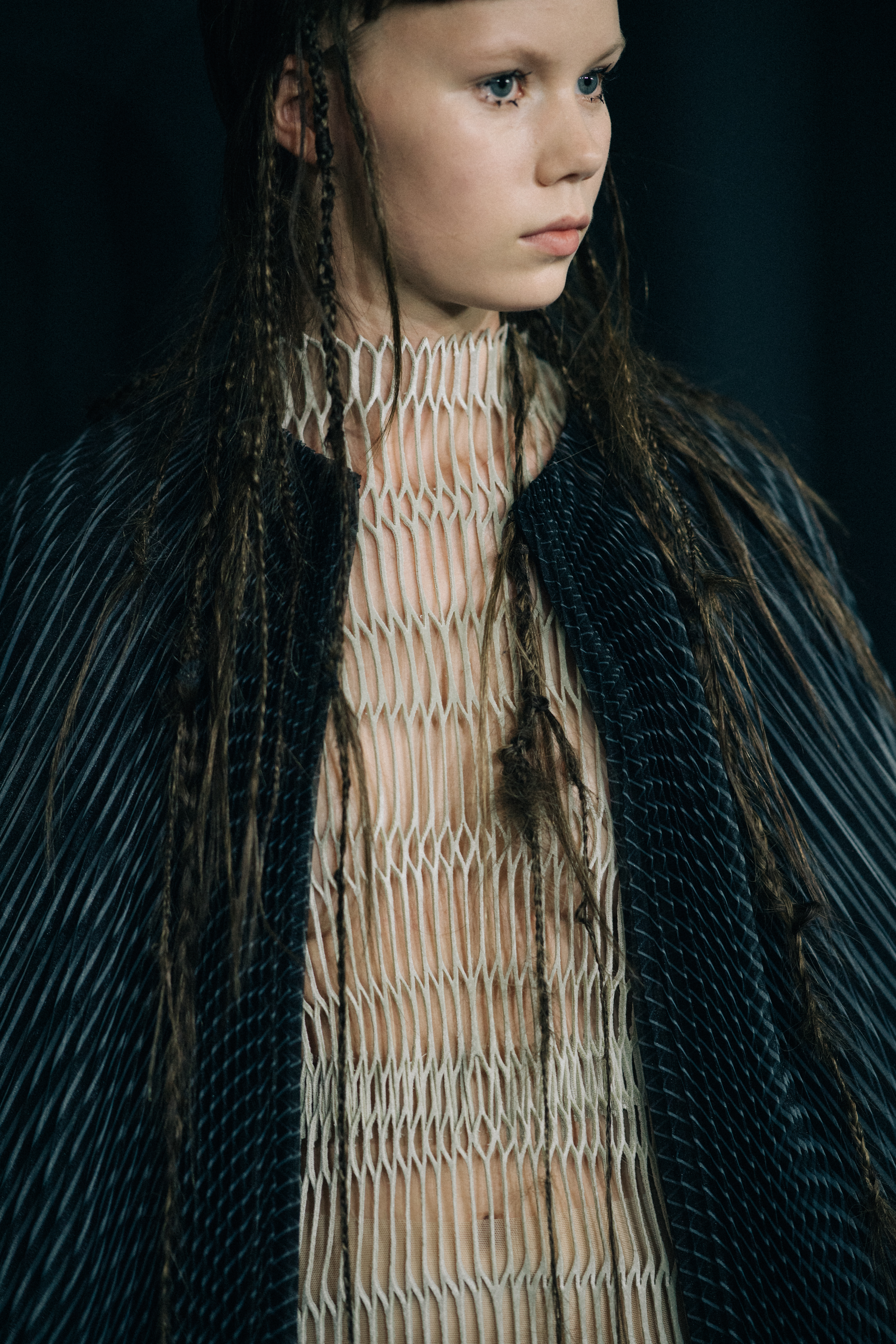 Model wearing beautiful dress before a show