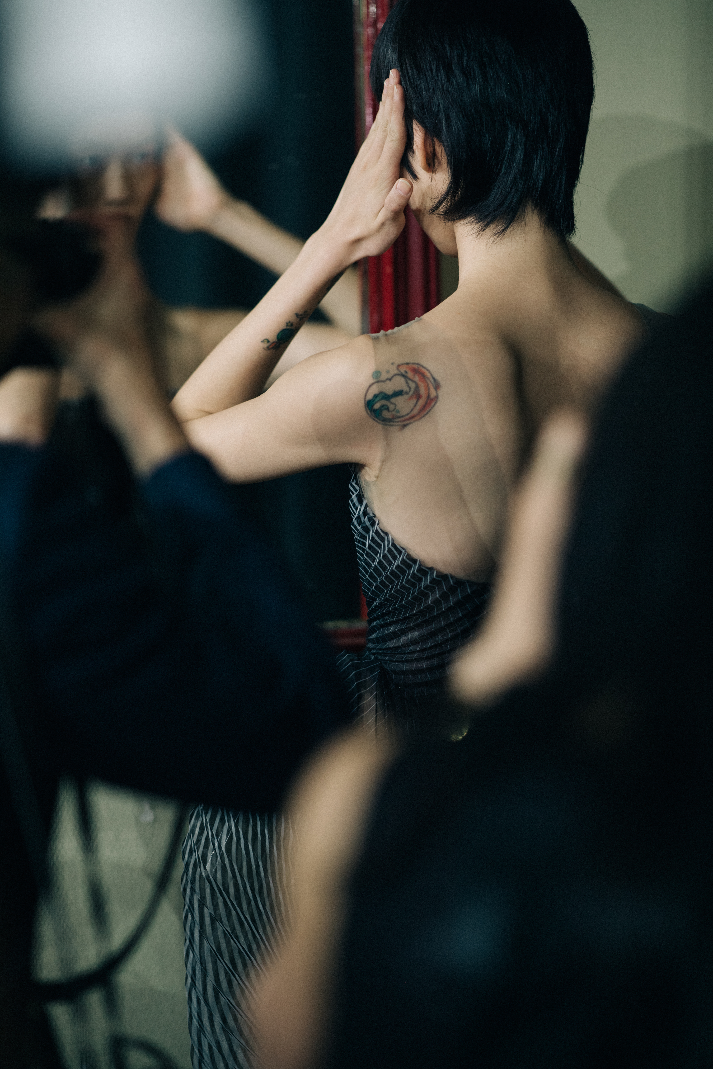 Model wearing beautiful dress before a show