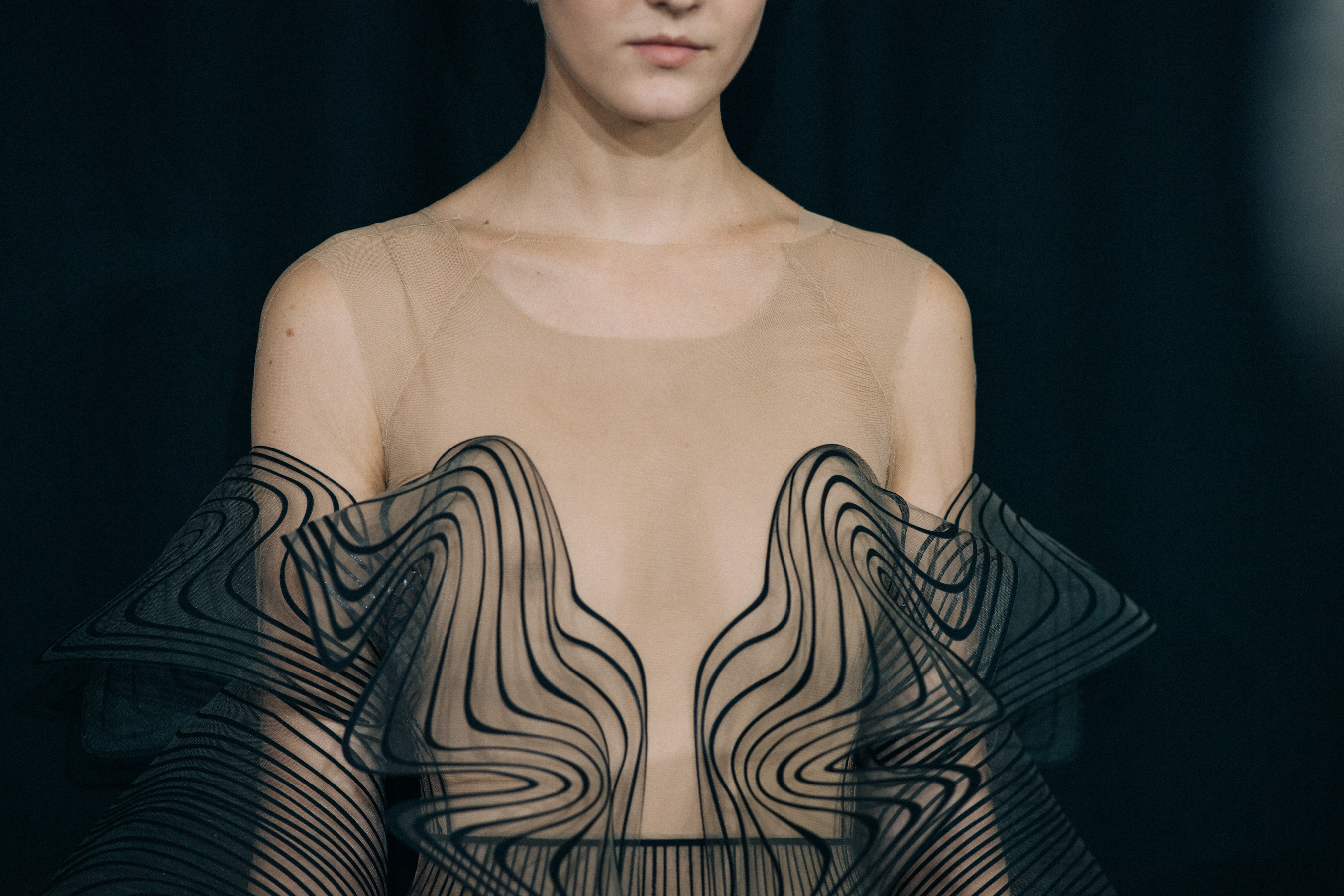 Model wearing beautiful dress before a show