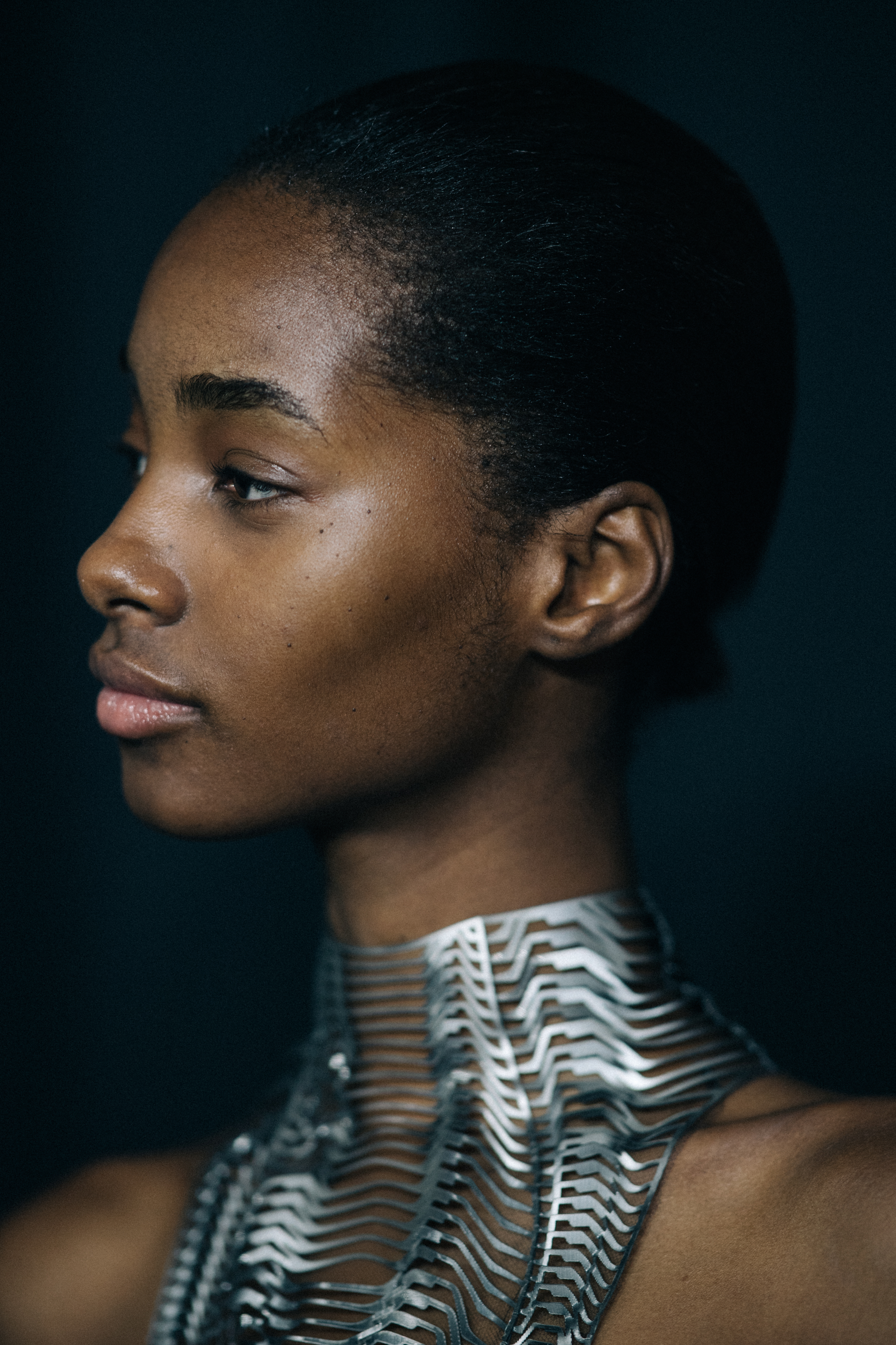 Model wearing beautiful dress before a show