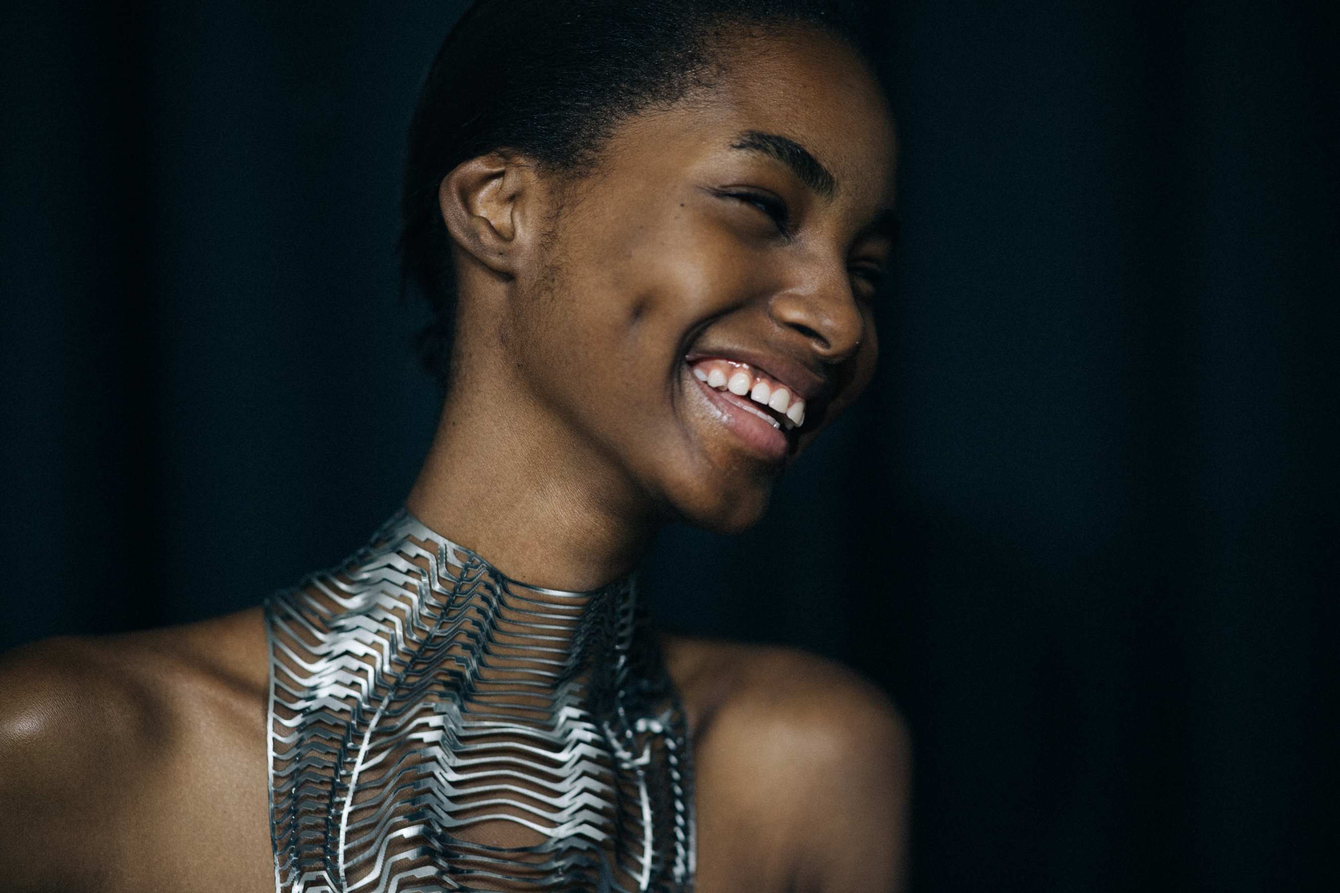 Model wearing beautiful dress before a show