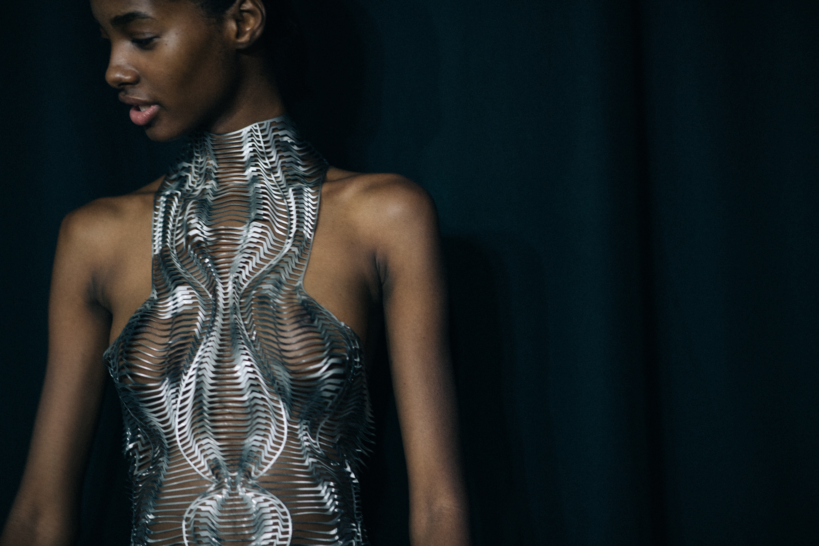 Model wearing beautiful dress before a show