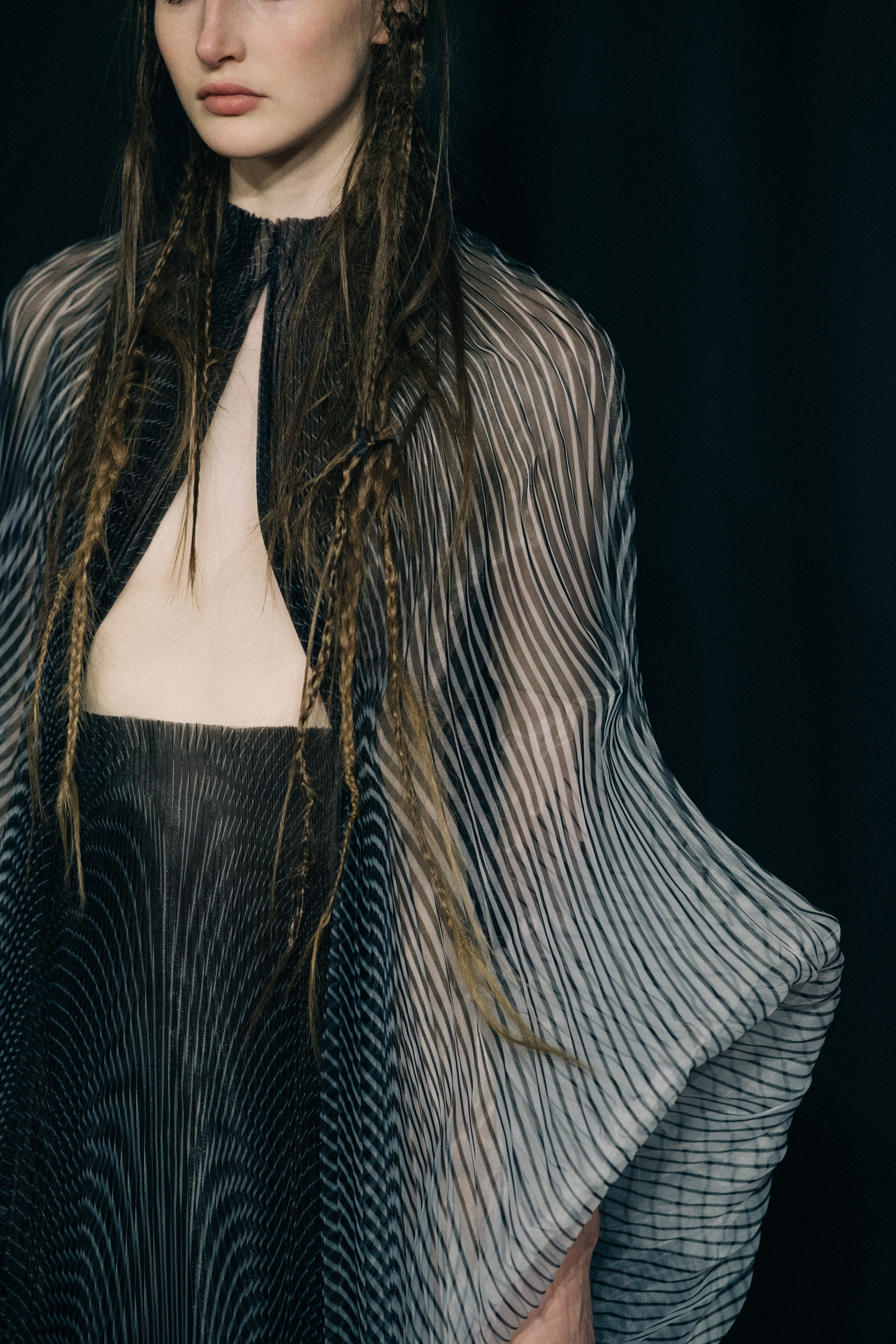 Model wearing beautiful dress before a show