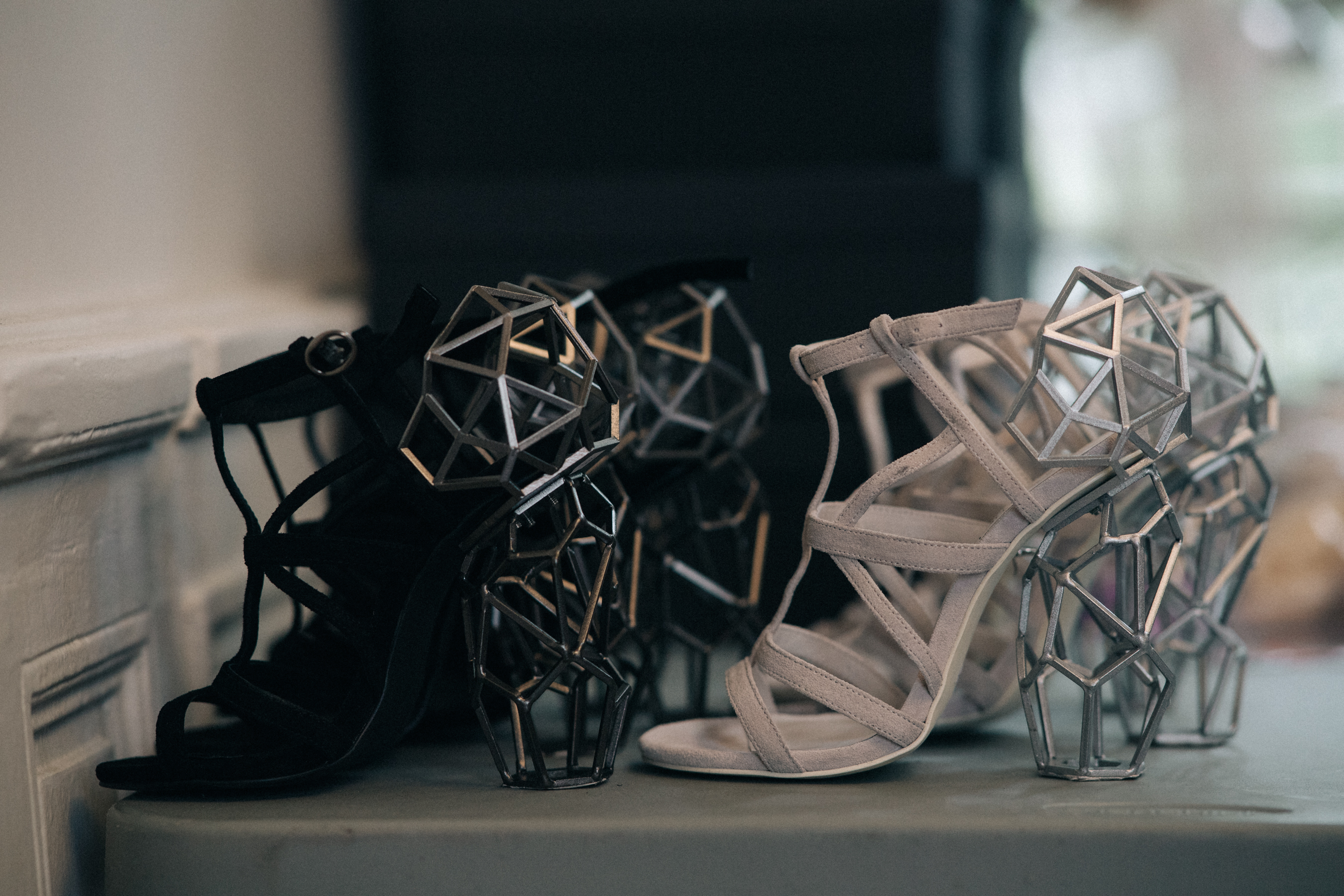 Shoes with geometric heels