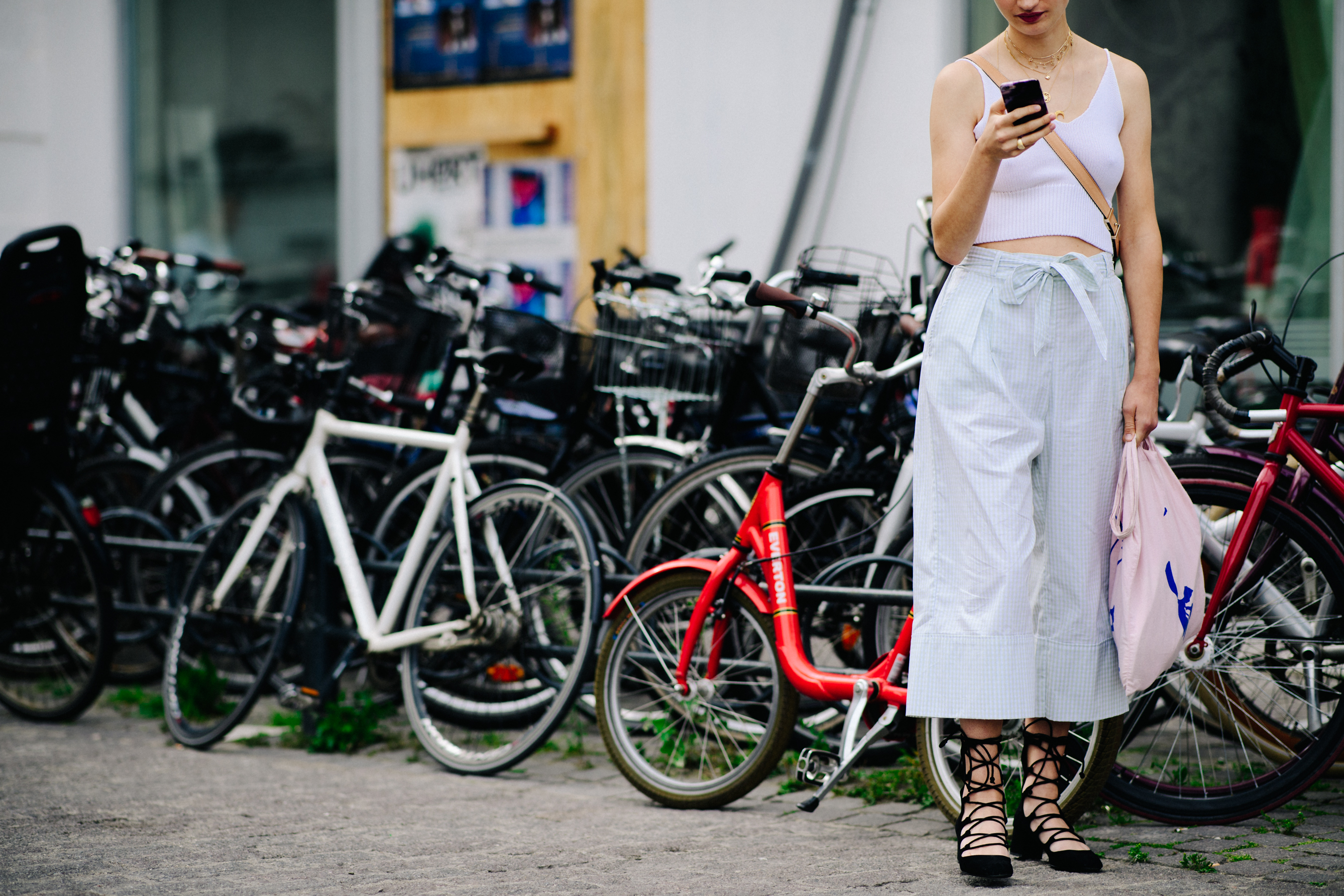Girl wearing white outfit and sandals