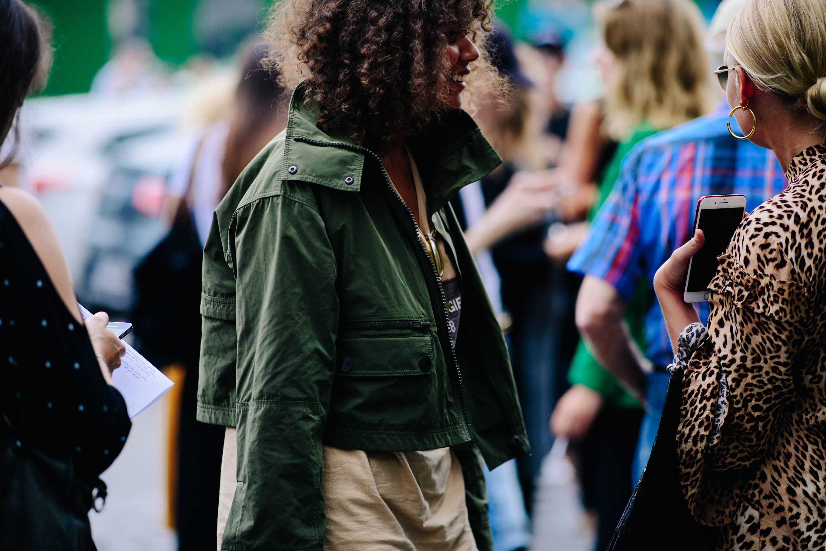 Woman wearing green military jacket