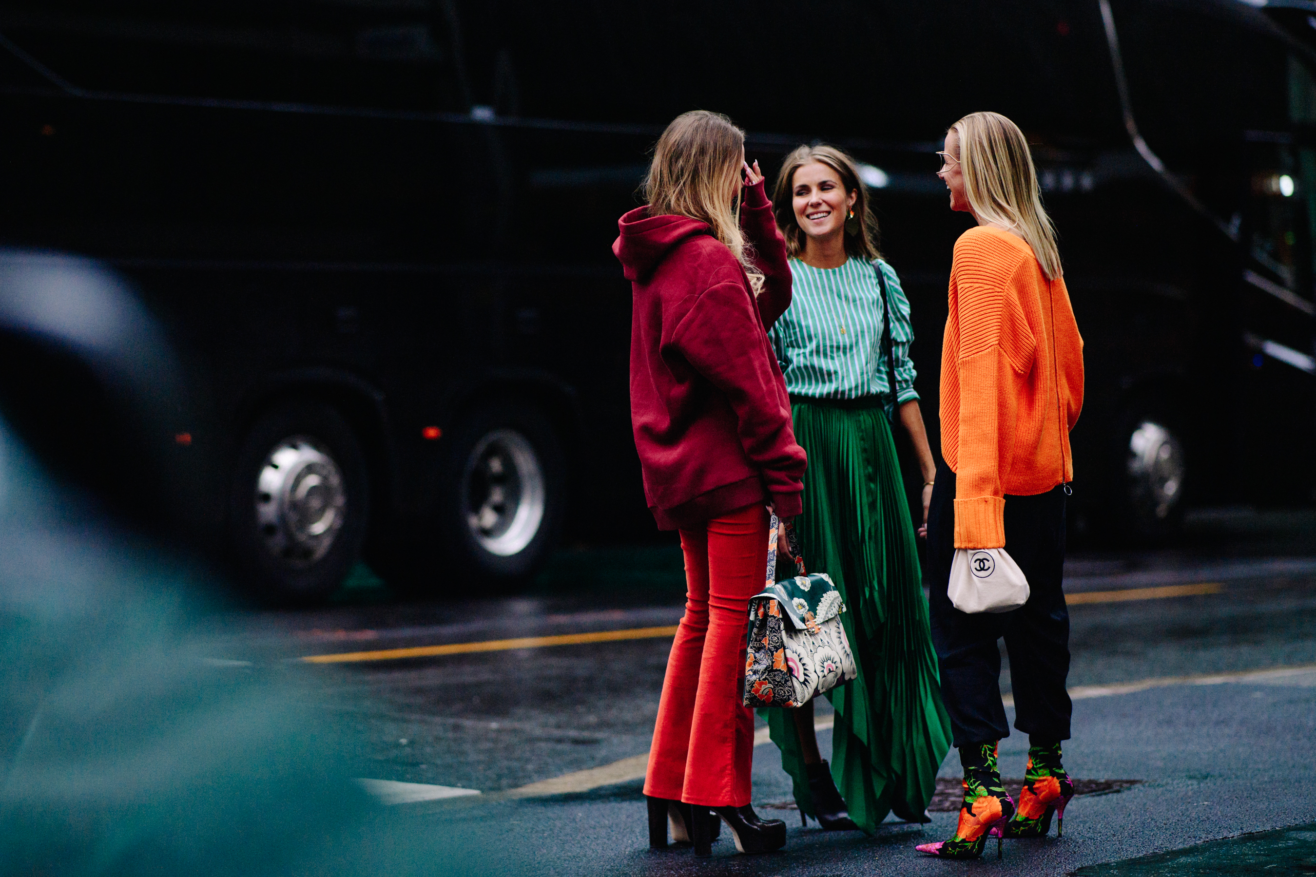 Group of bloggers wearing orange outfits