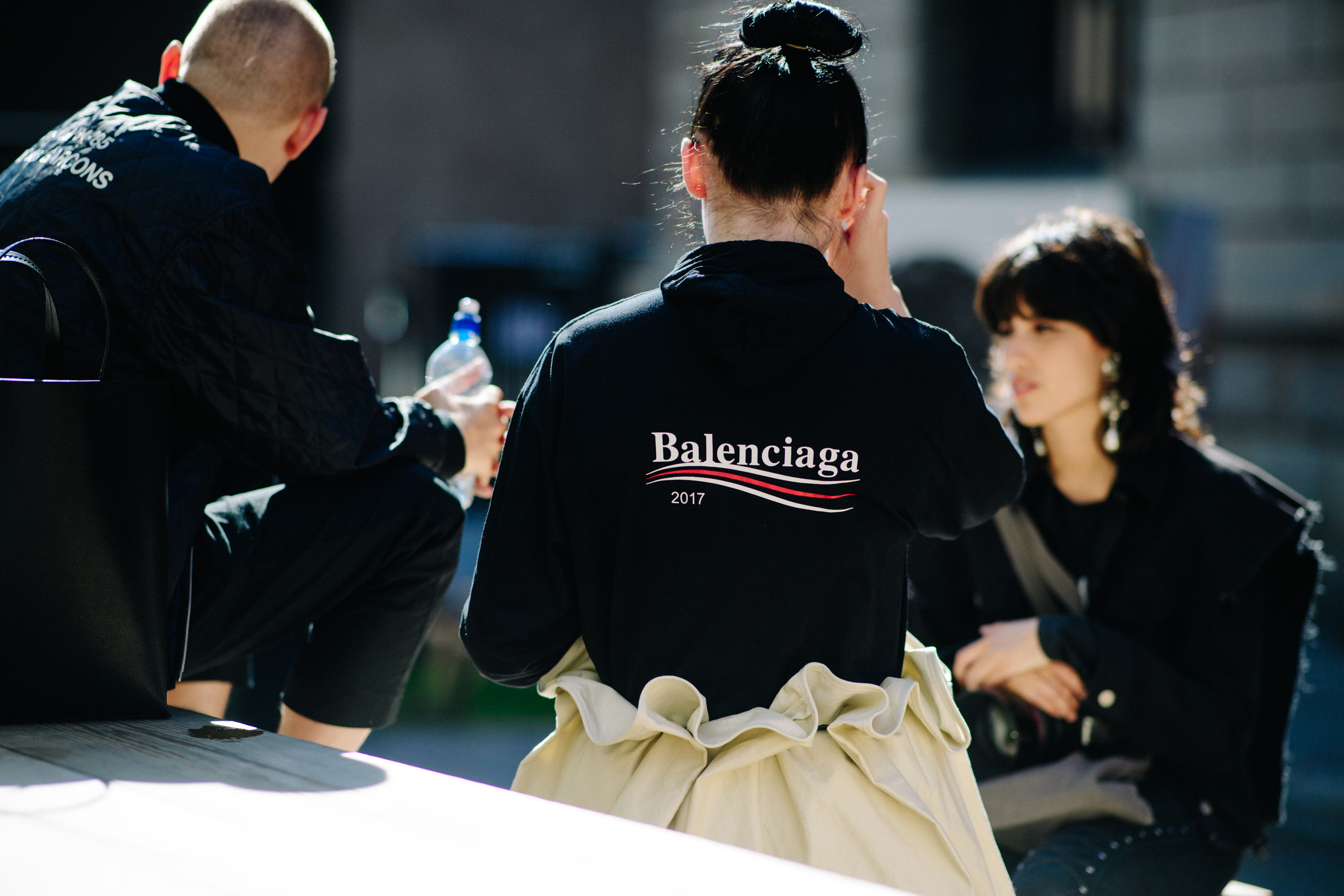 Woman wearing Balenciaga shirt