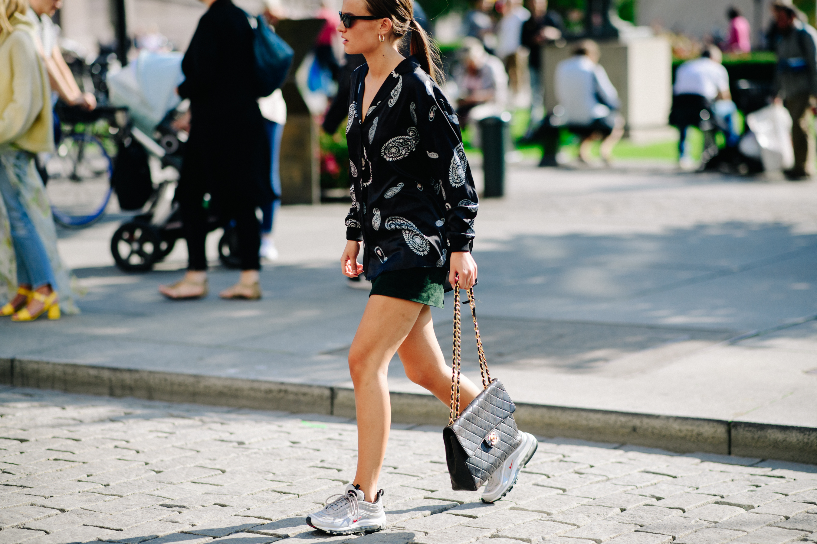 Woman wearing Nike and Chanel