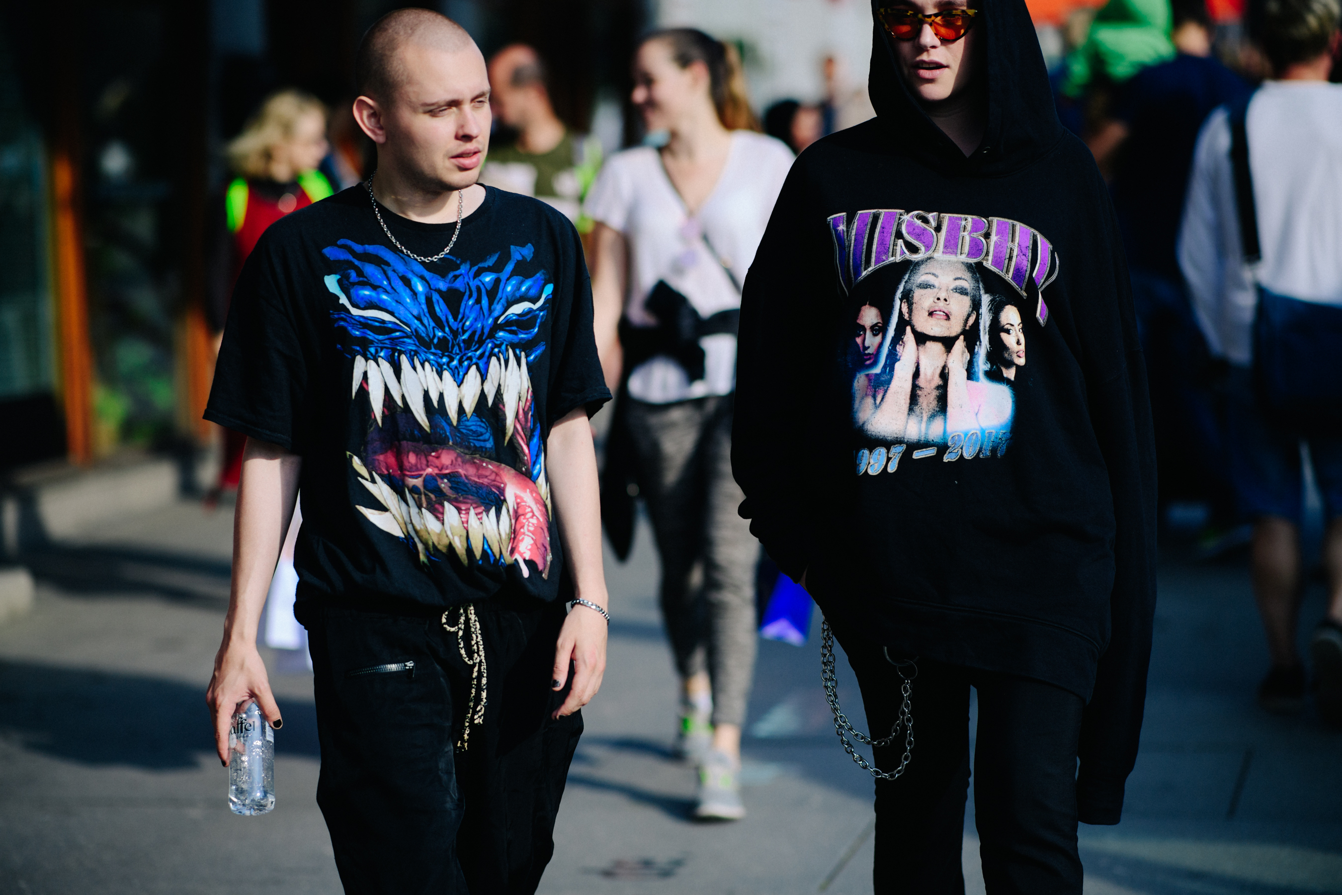 Man and woman wearing street wear