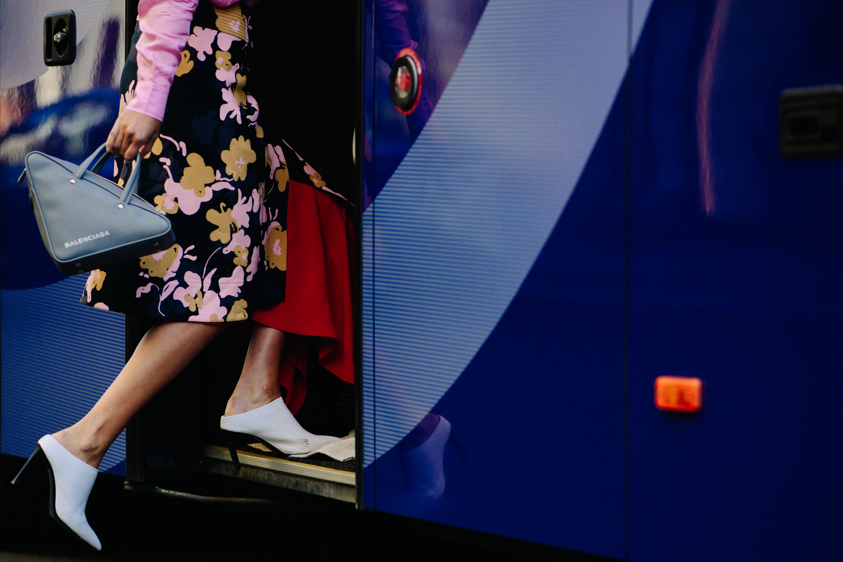 Two women wearing balenciaga bags